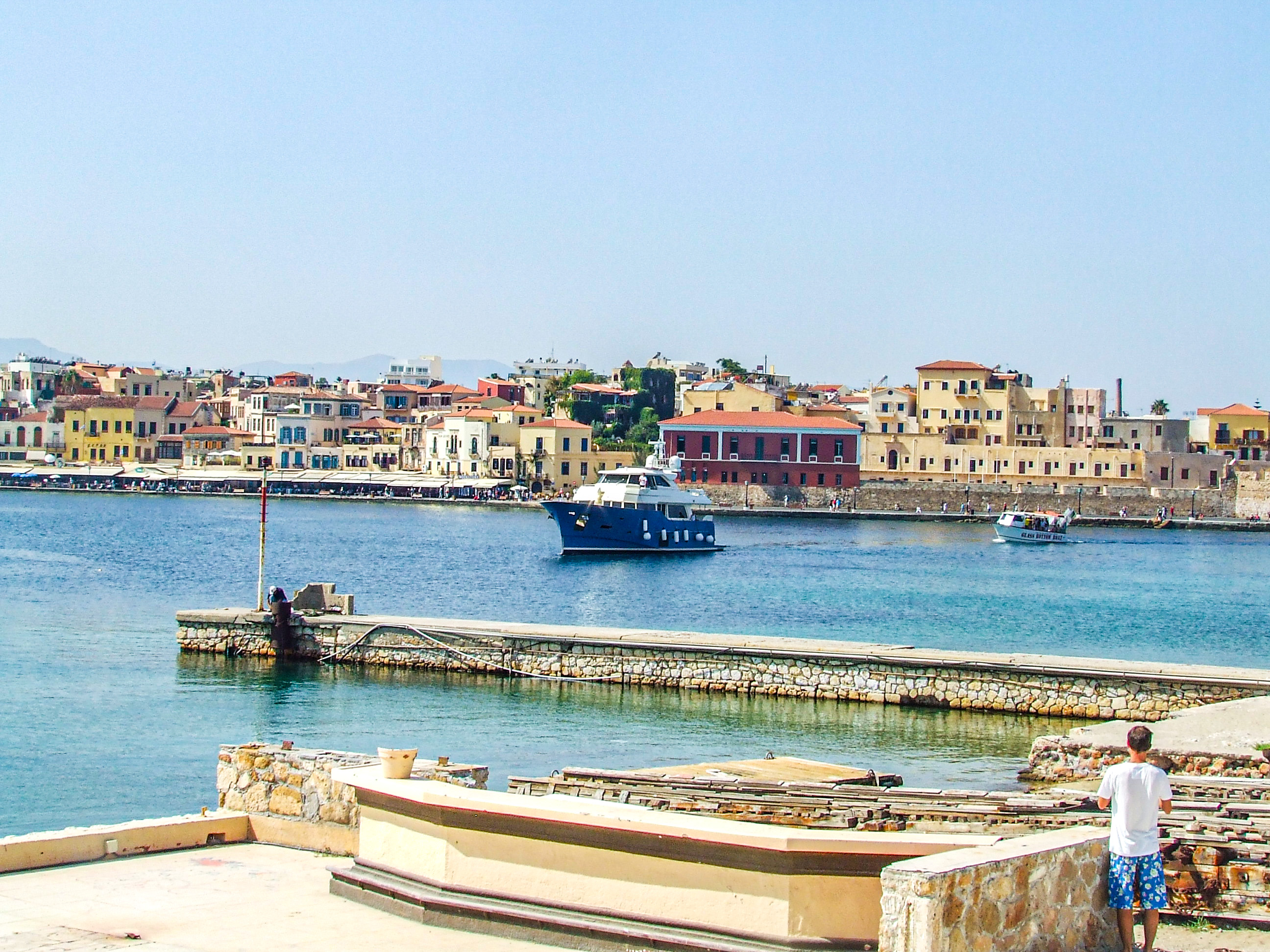 A yacht is sailing in the harbor