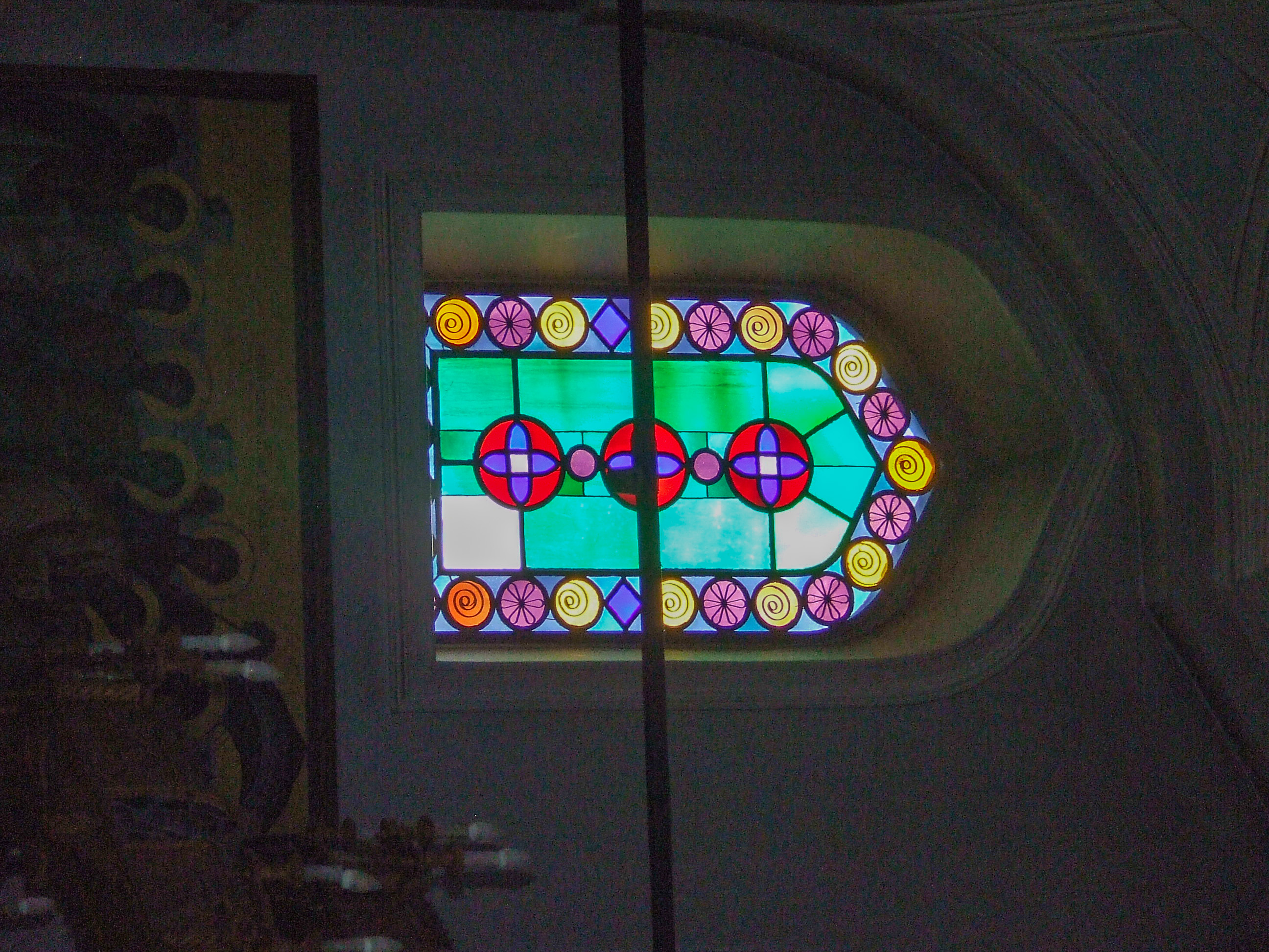 stained glass window with a vibrant and colorful design