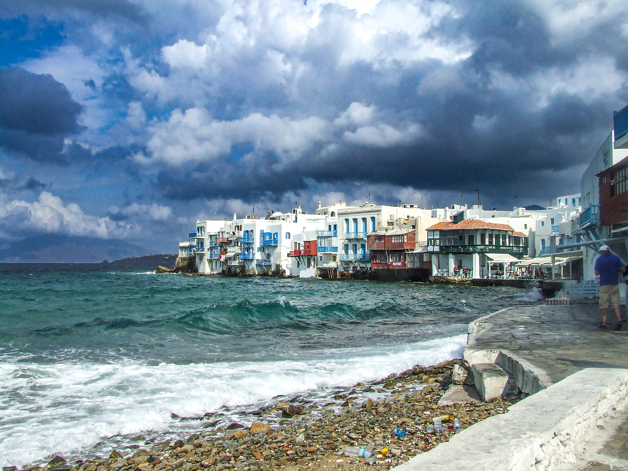 row of colorful houses along the shoreline