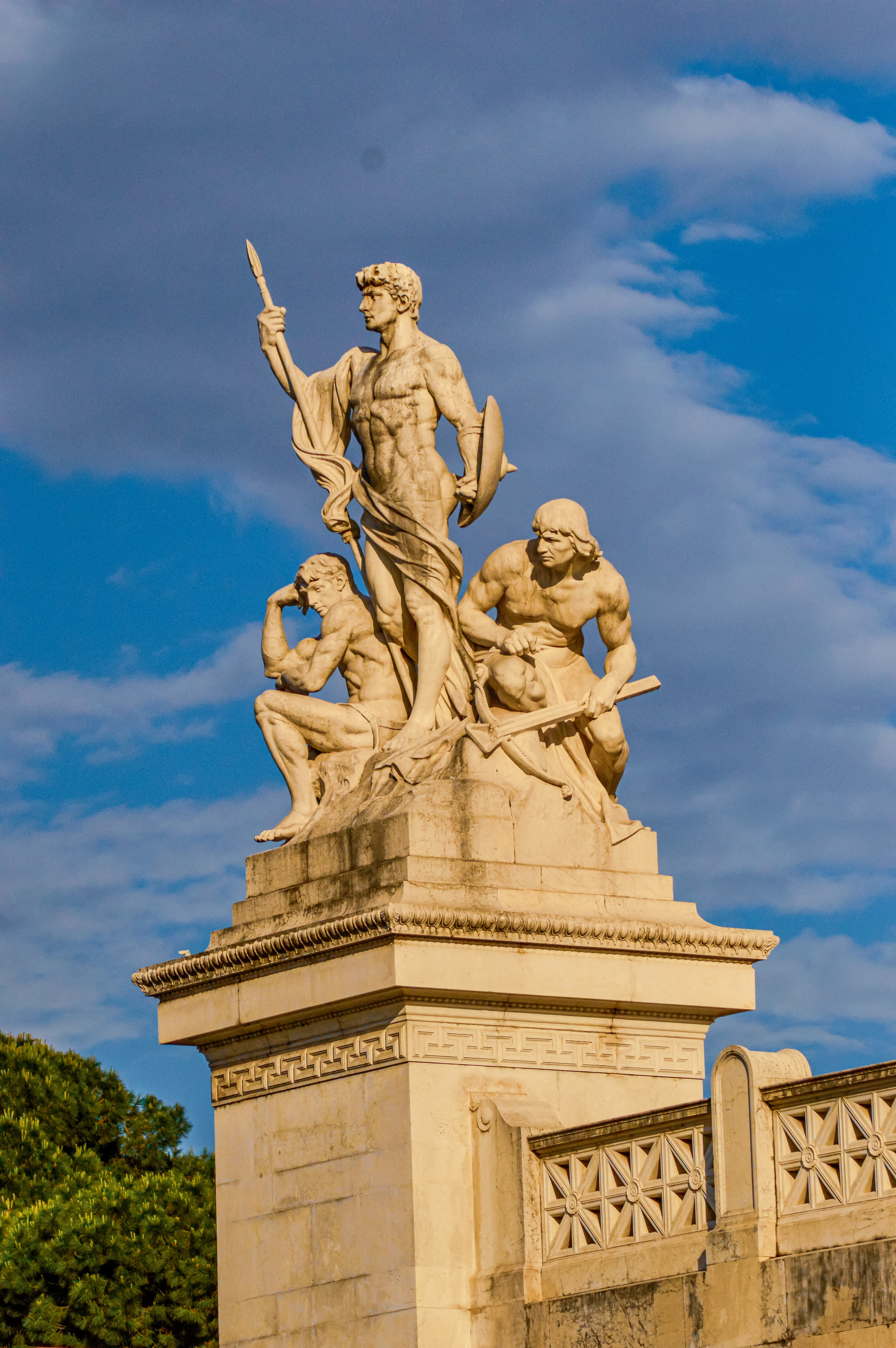 muscular man holding a sword aloft