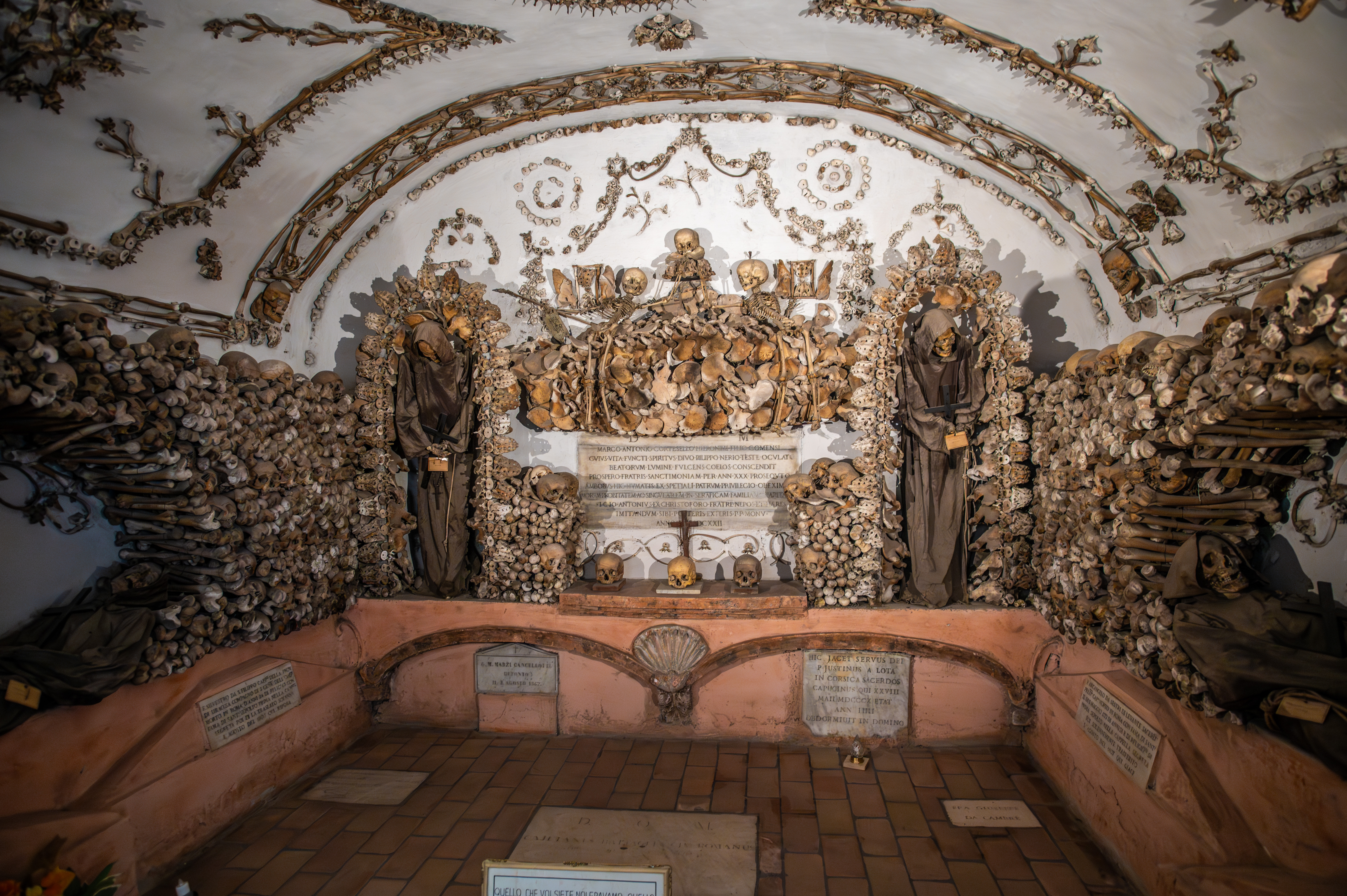 interior of a chapel adorned with numerous human skeletal remains