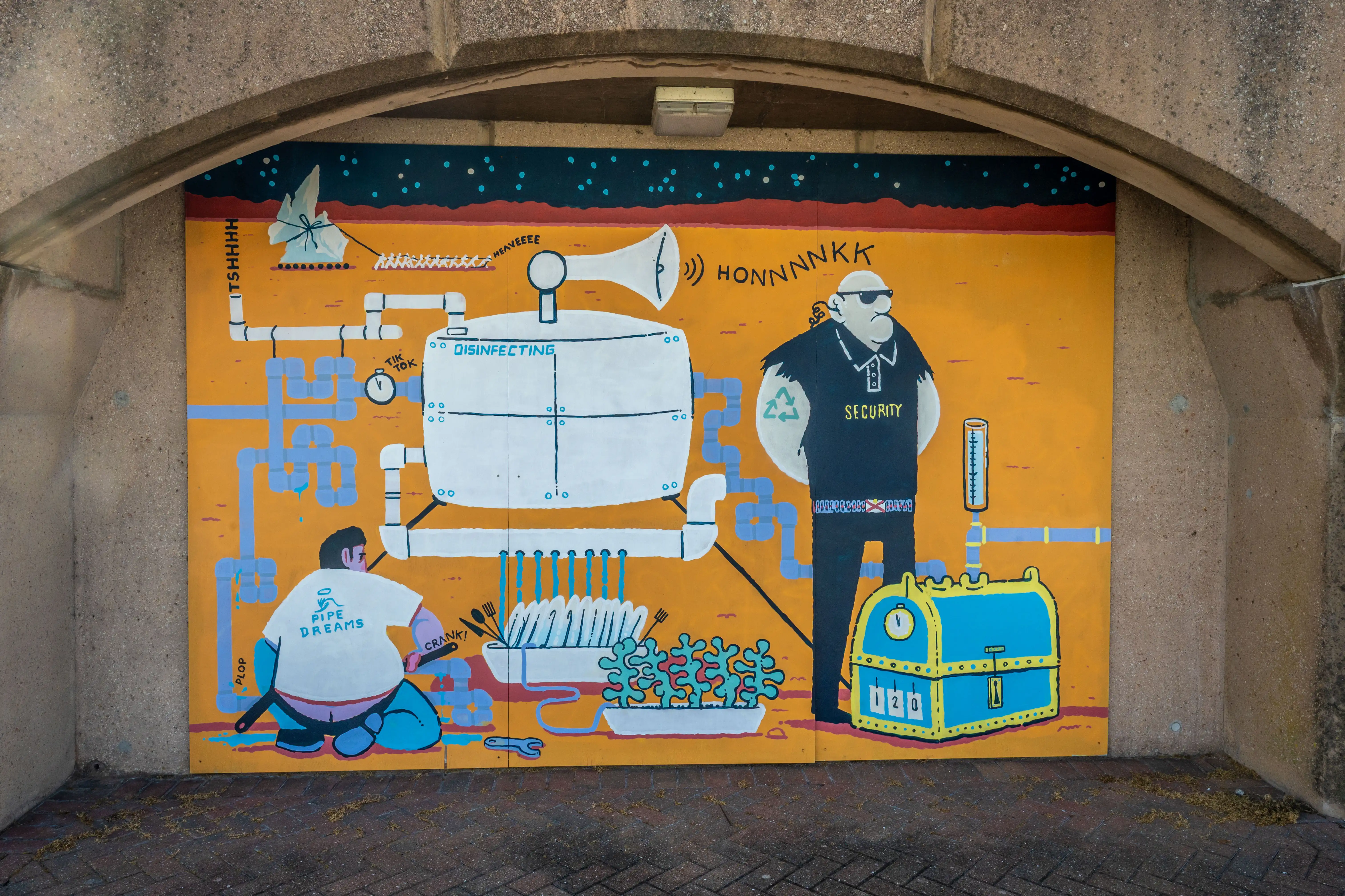 A colourful mural depicts a fantastical plumbing system with a disinfection tank, a figure labelled 