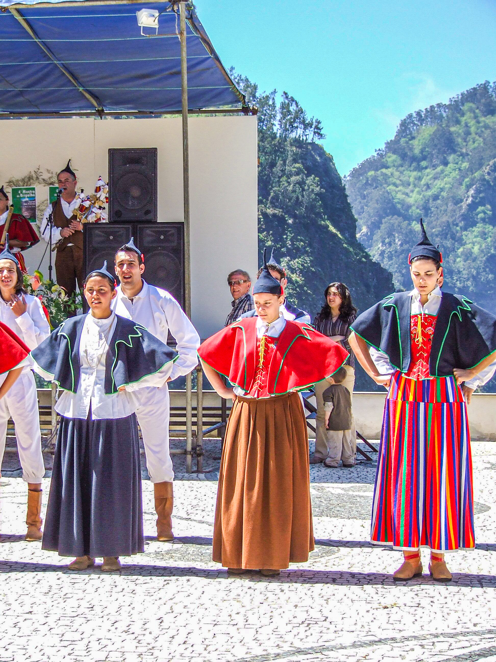 Participants are dressed in traditional costumes