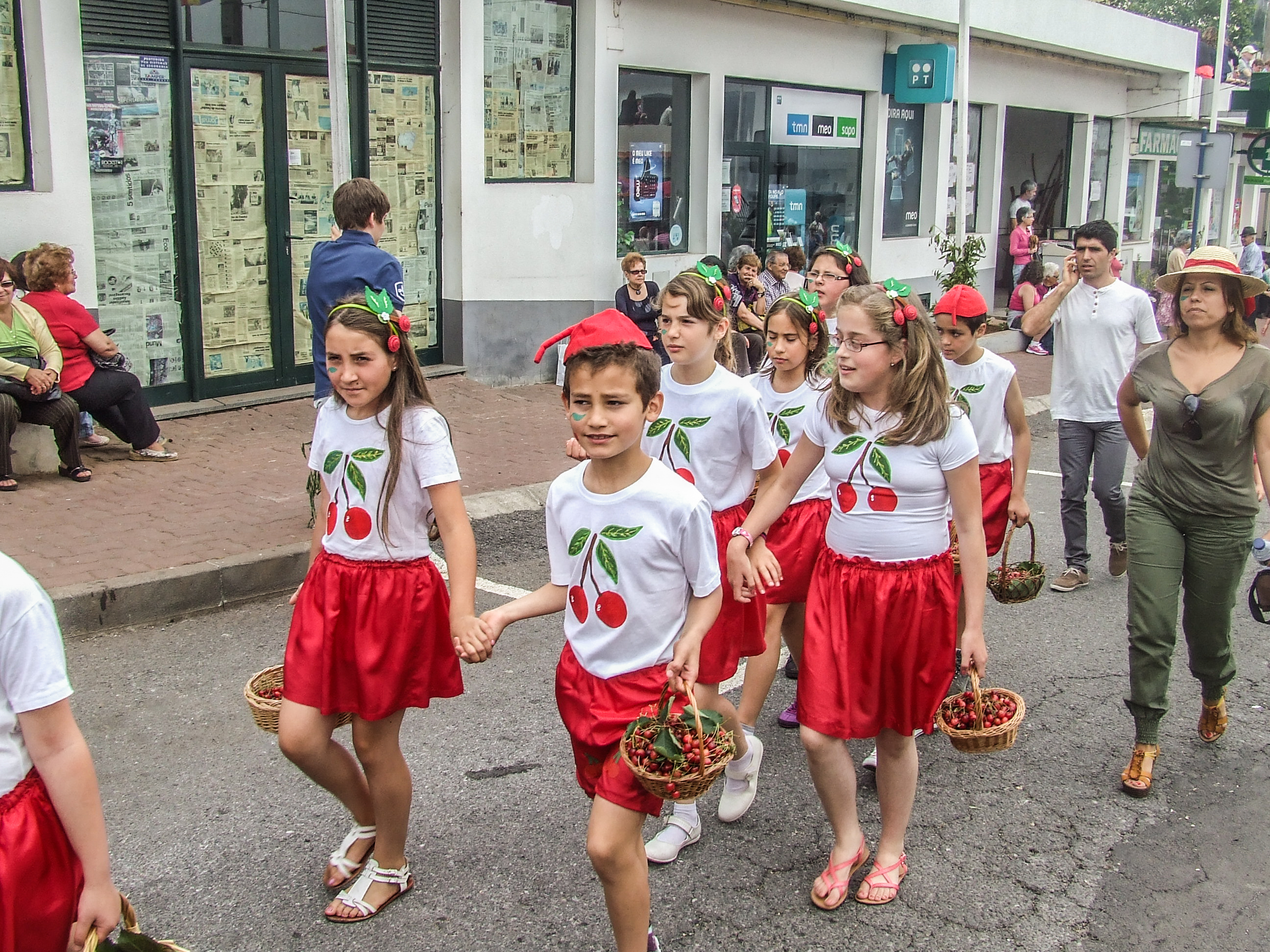 a group of children participating in a parade