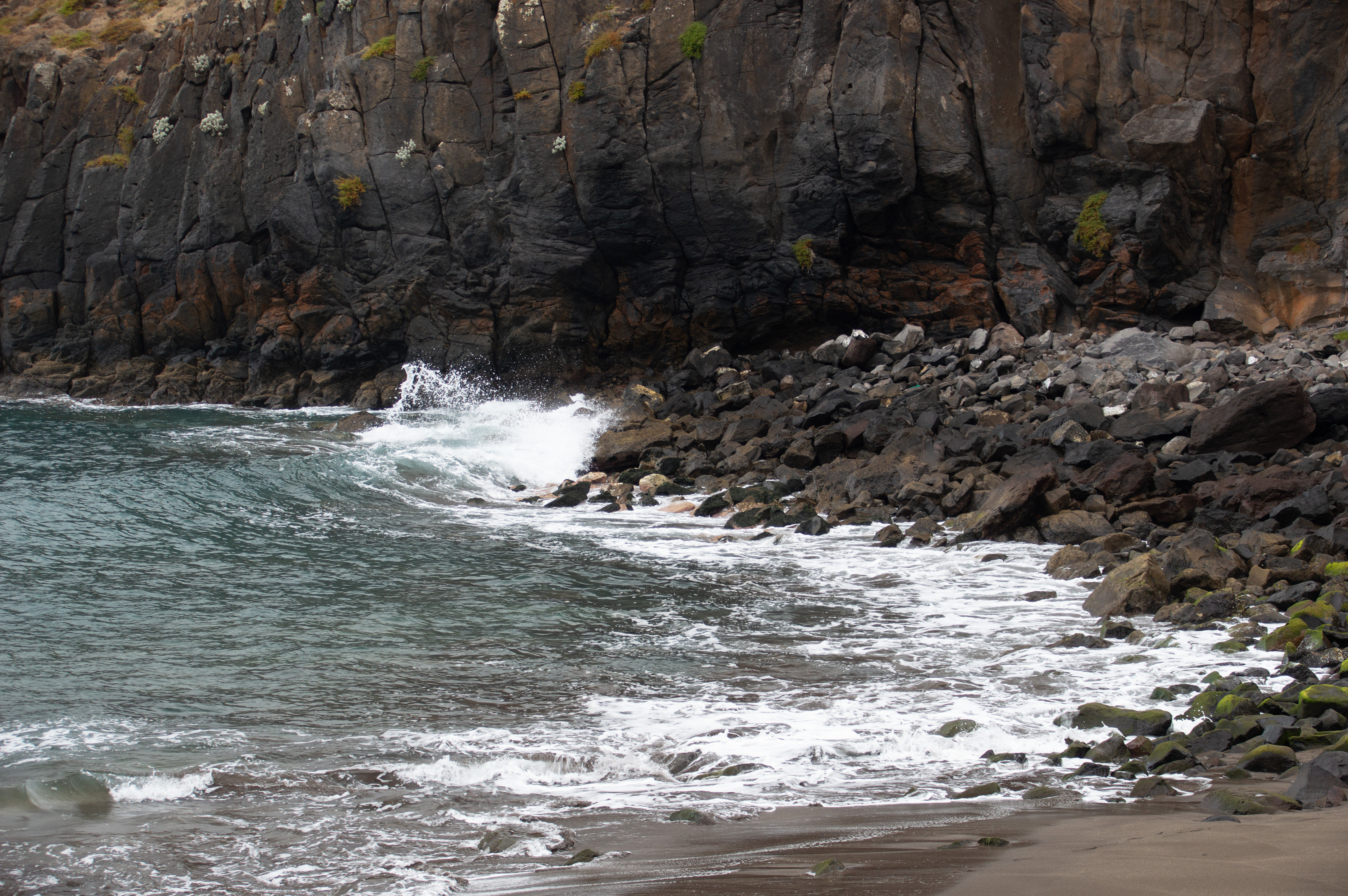 waves crashing against the rocks