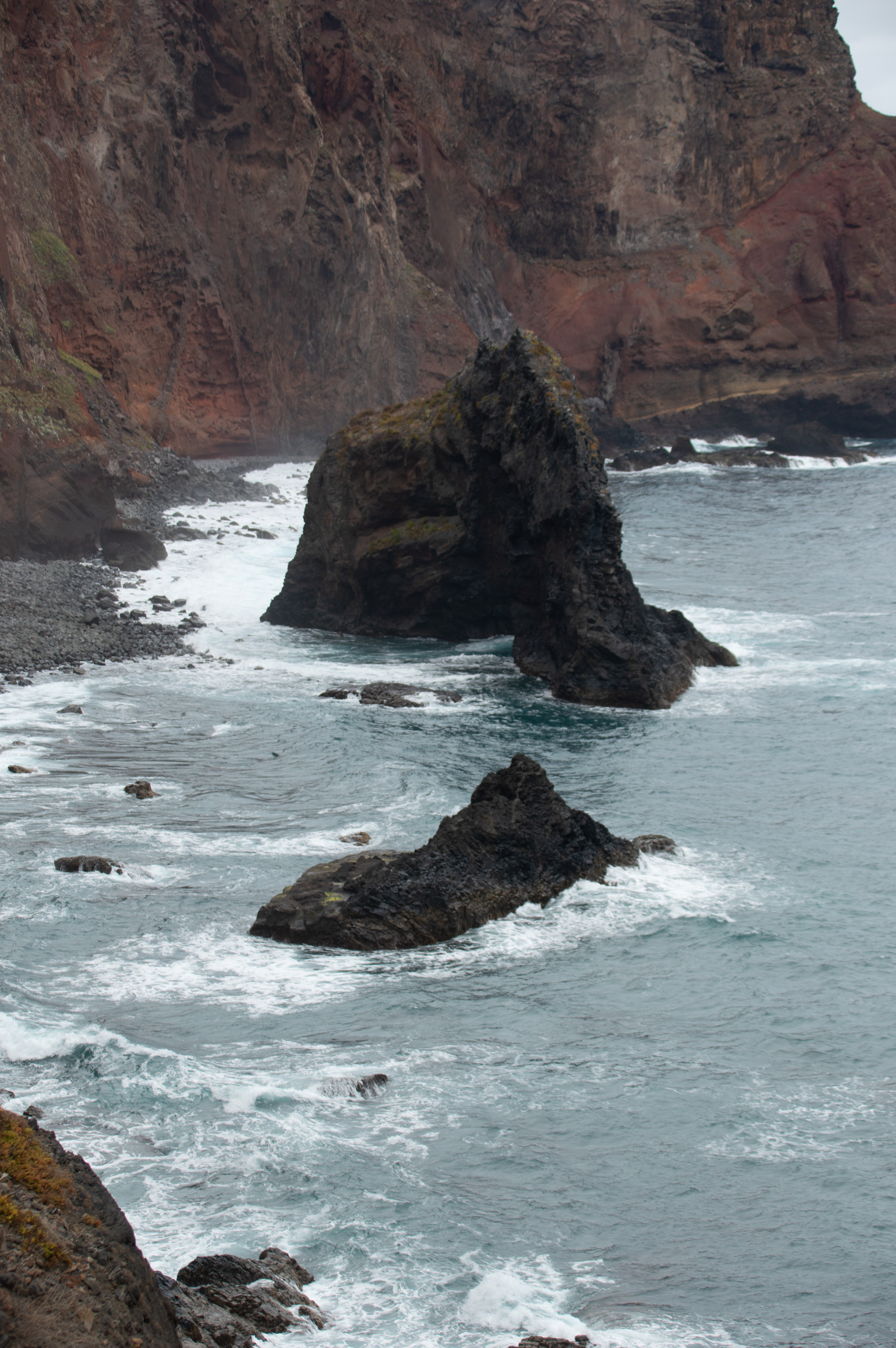 arge rocks jutting out of the water