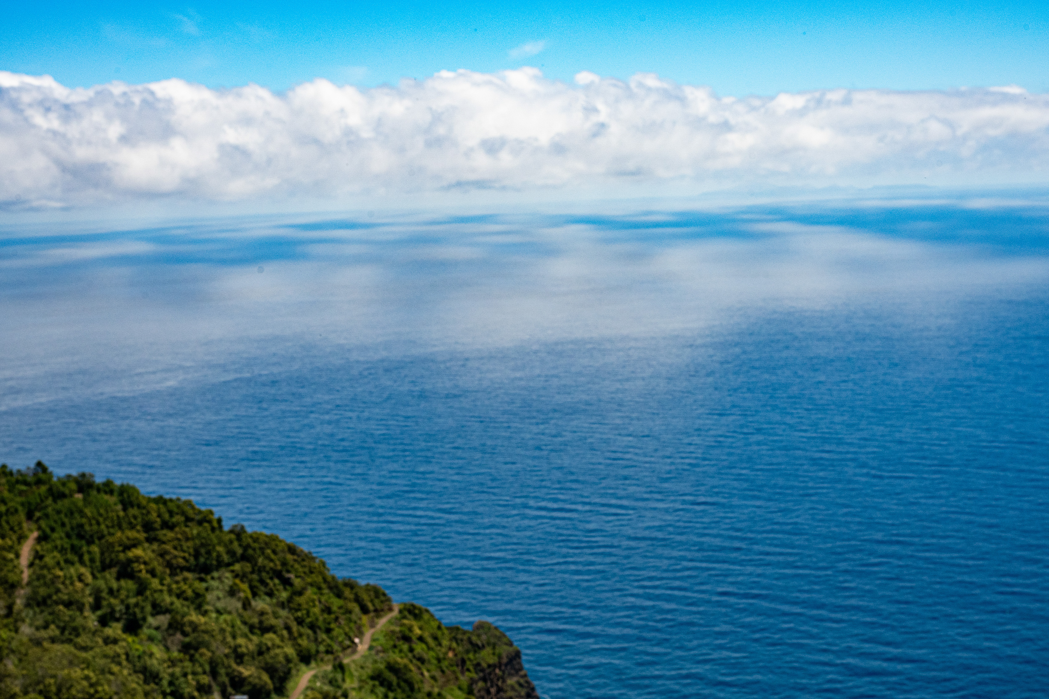 a vast expanse of calm blue water