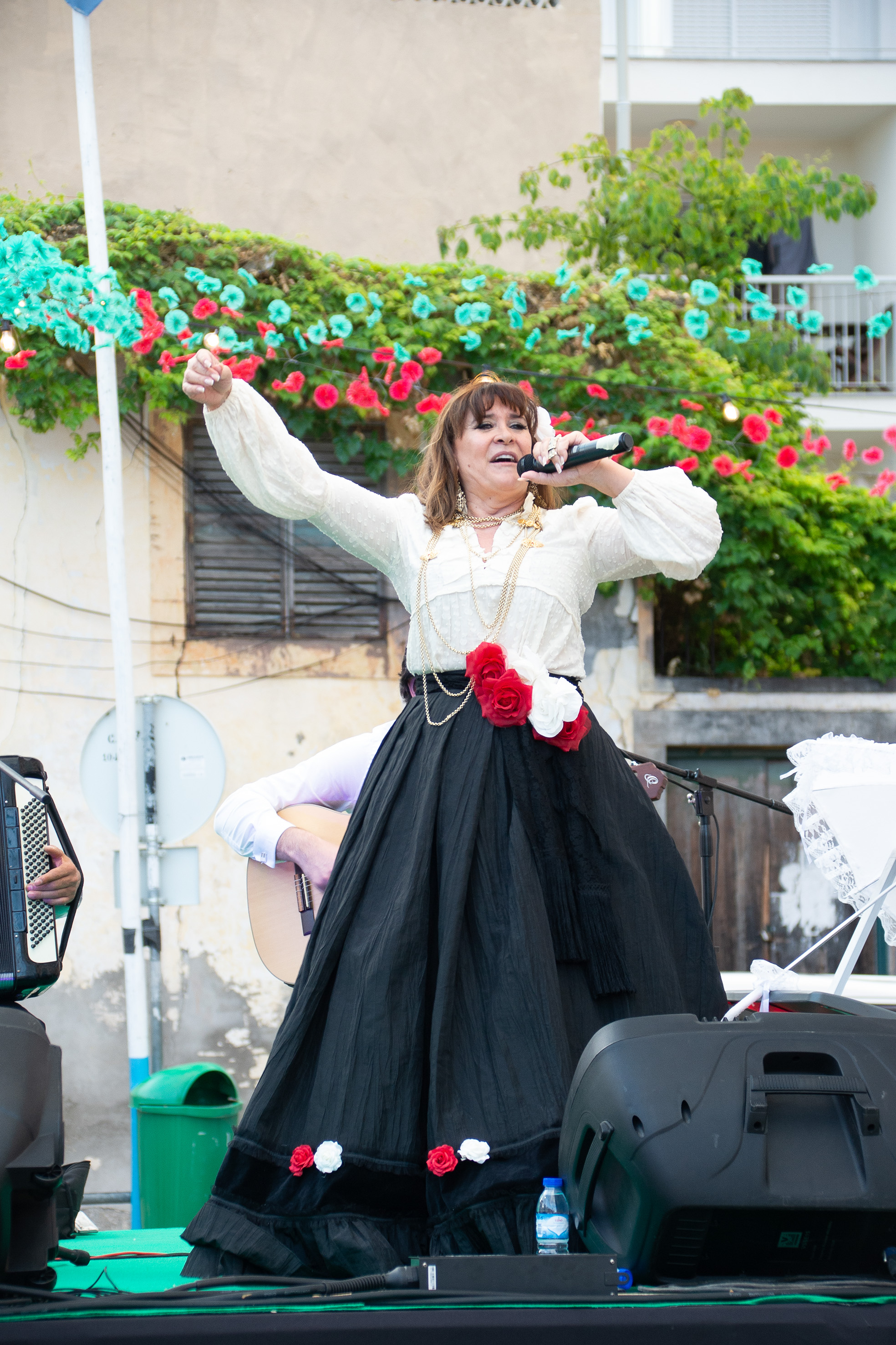 a woman performing on stage