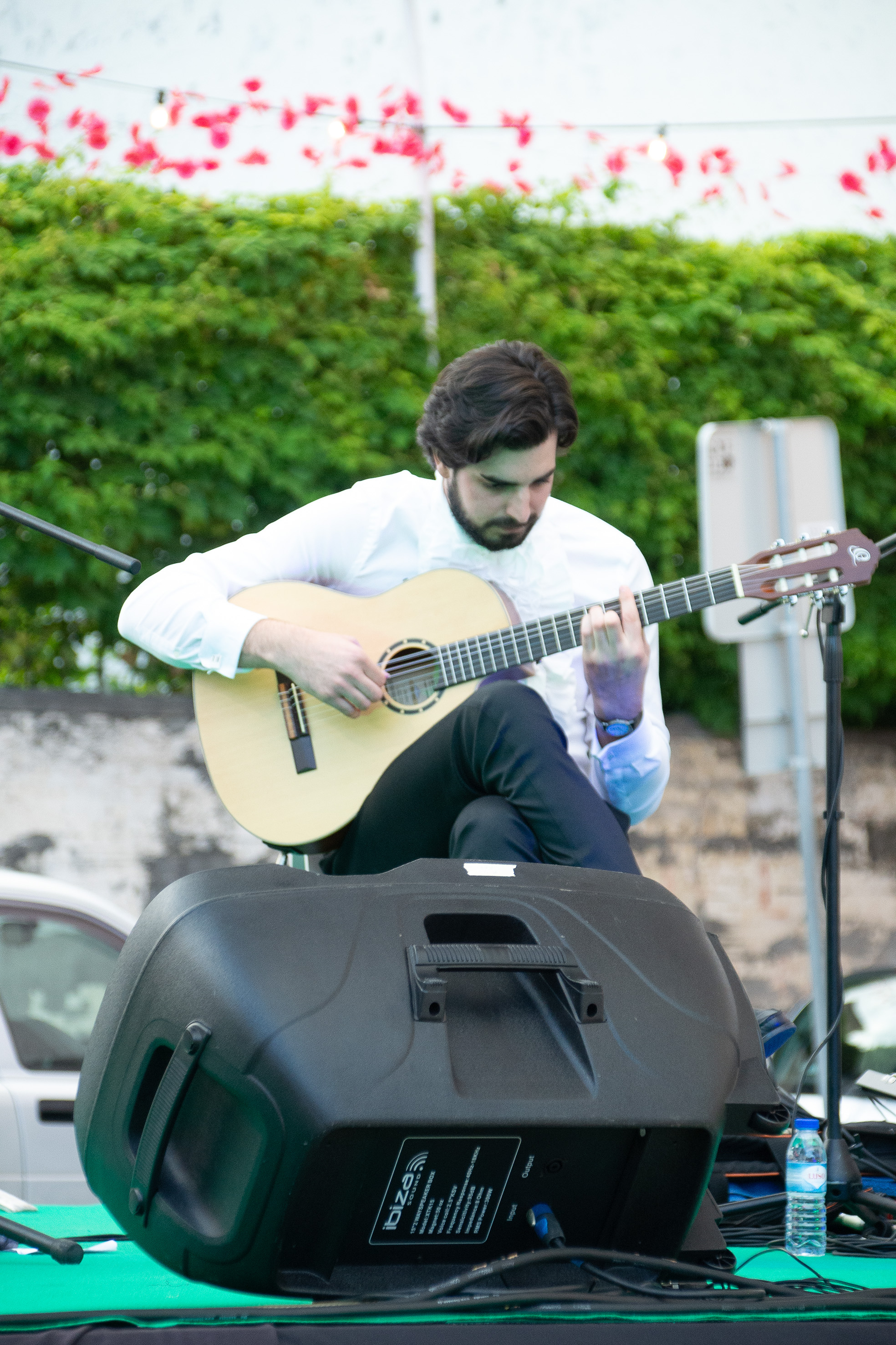 playing an acoustic guitar