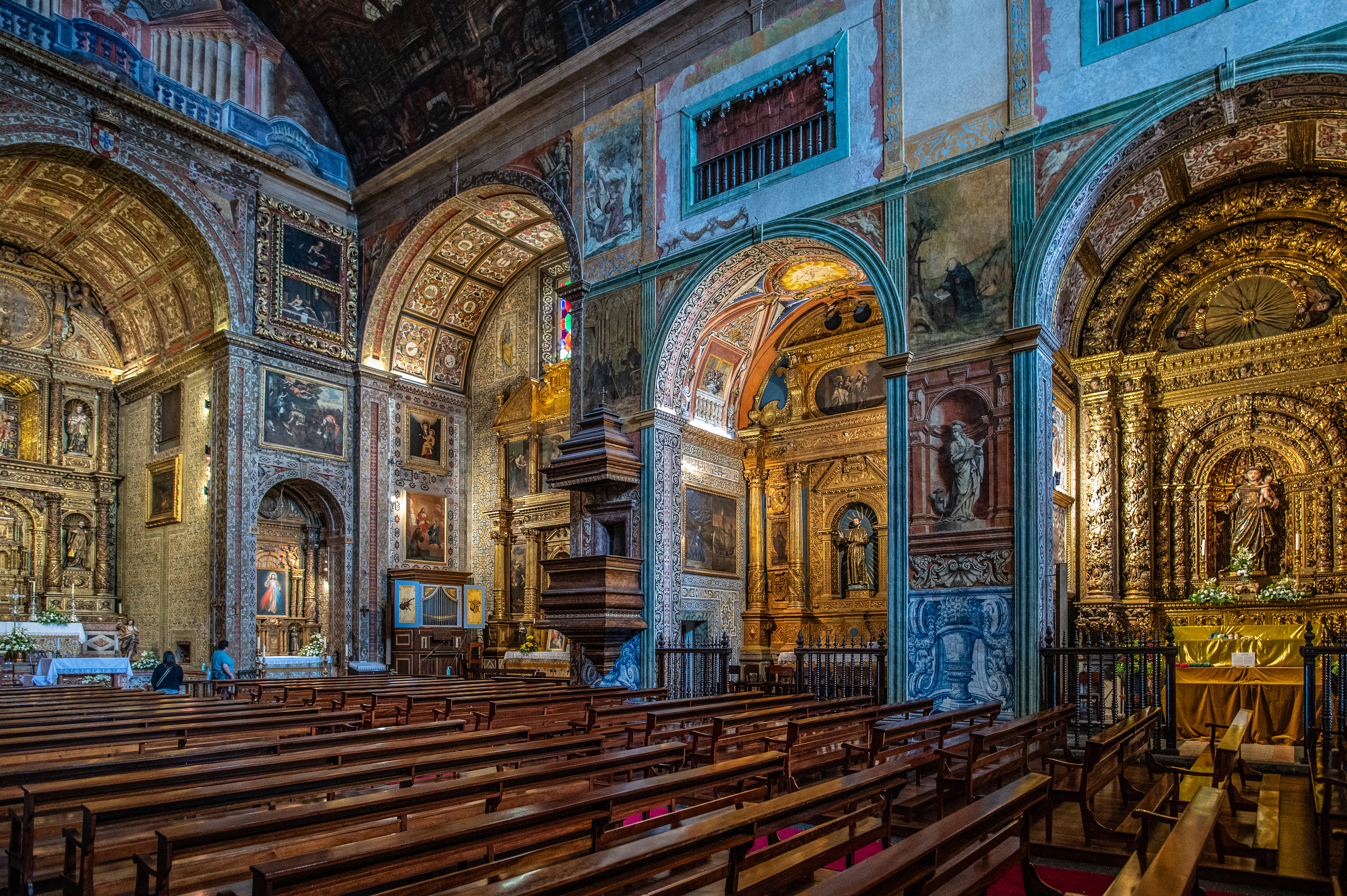 detailed frescoes, and elaborate altarpieces