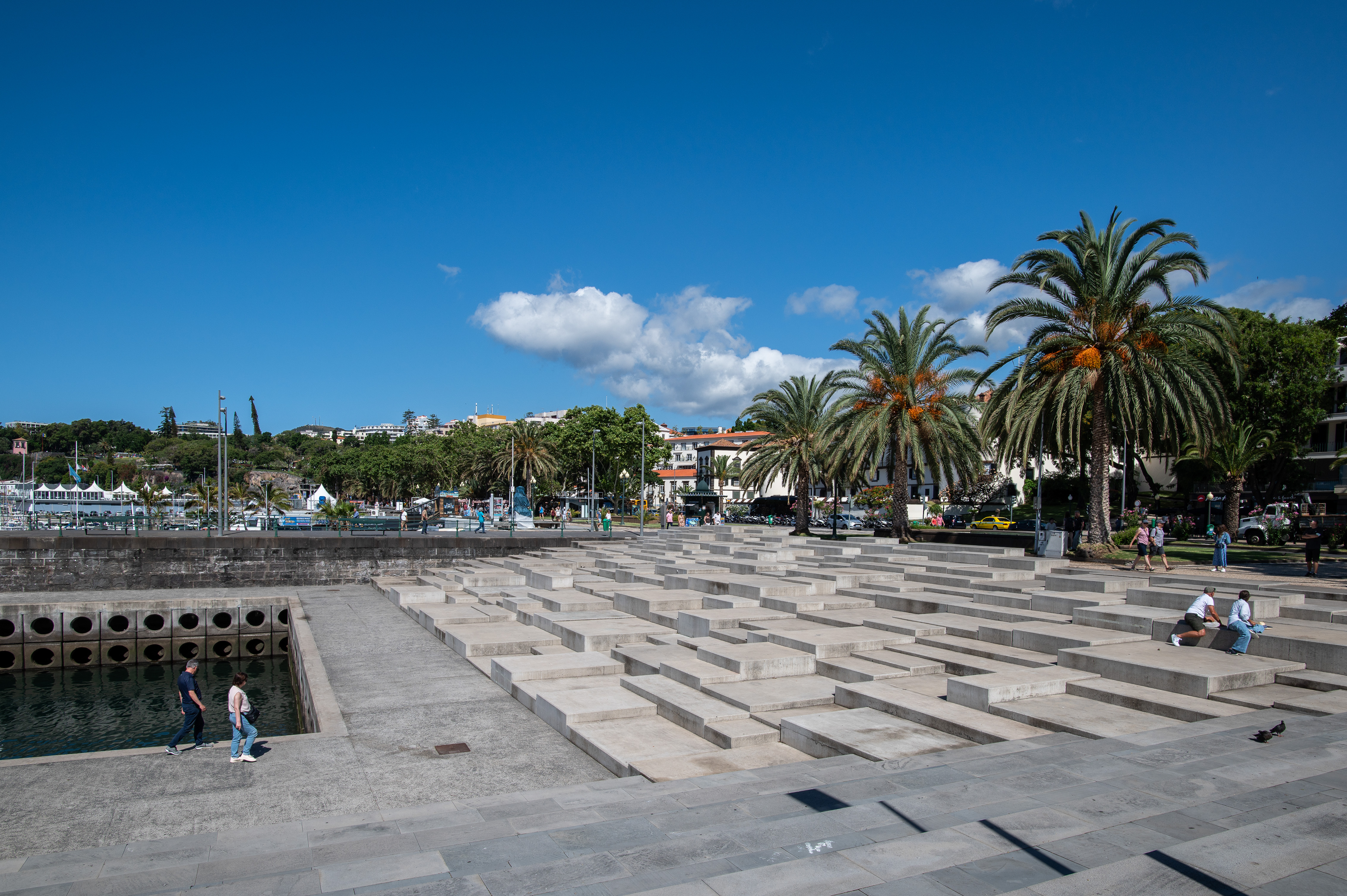 stepped concrete platforms leading down to a water channel