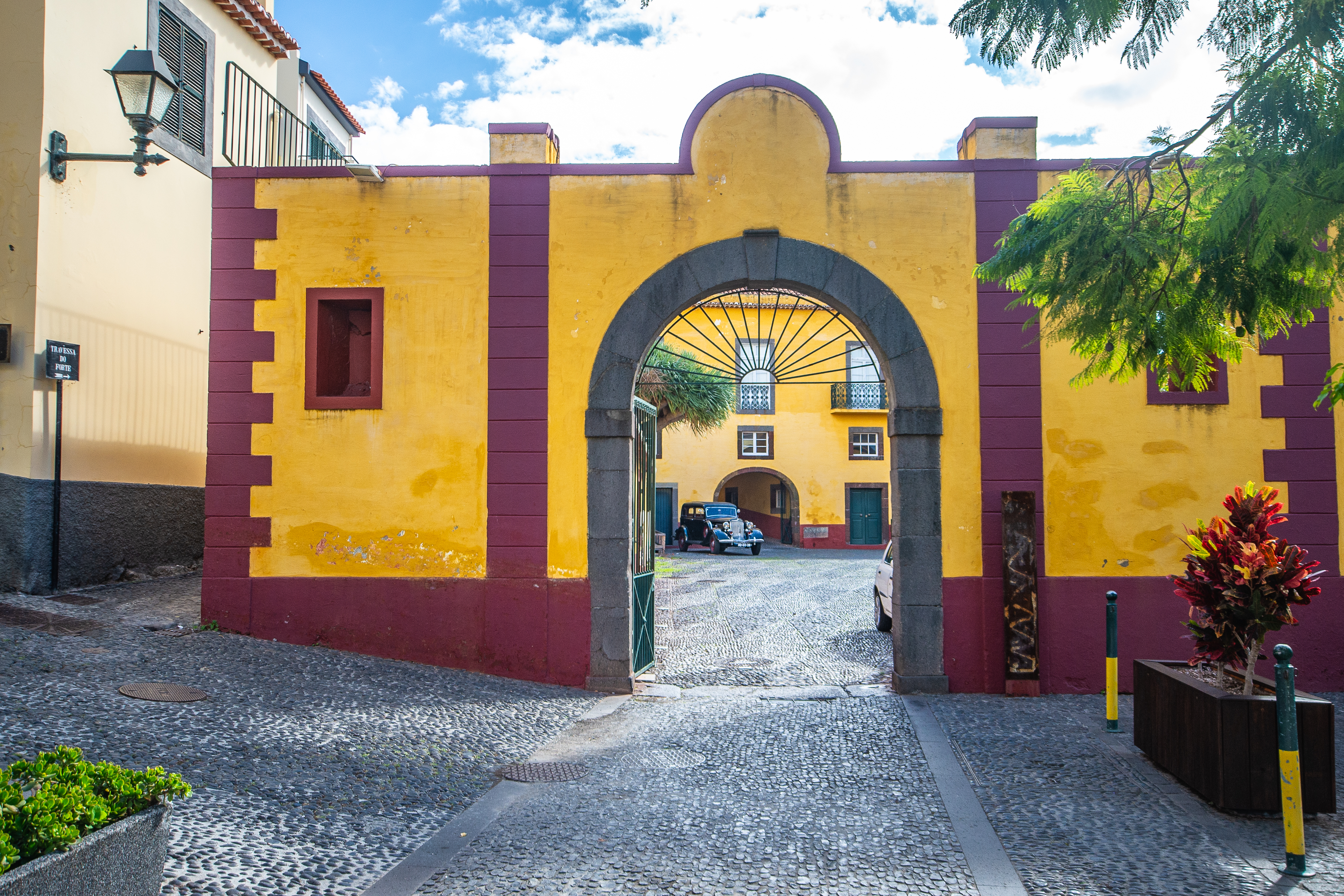 historical street scene with a prominent archway