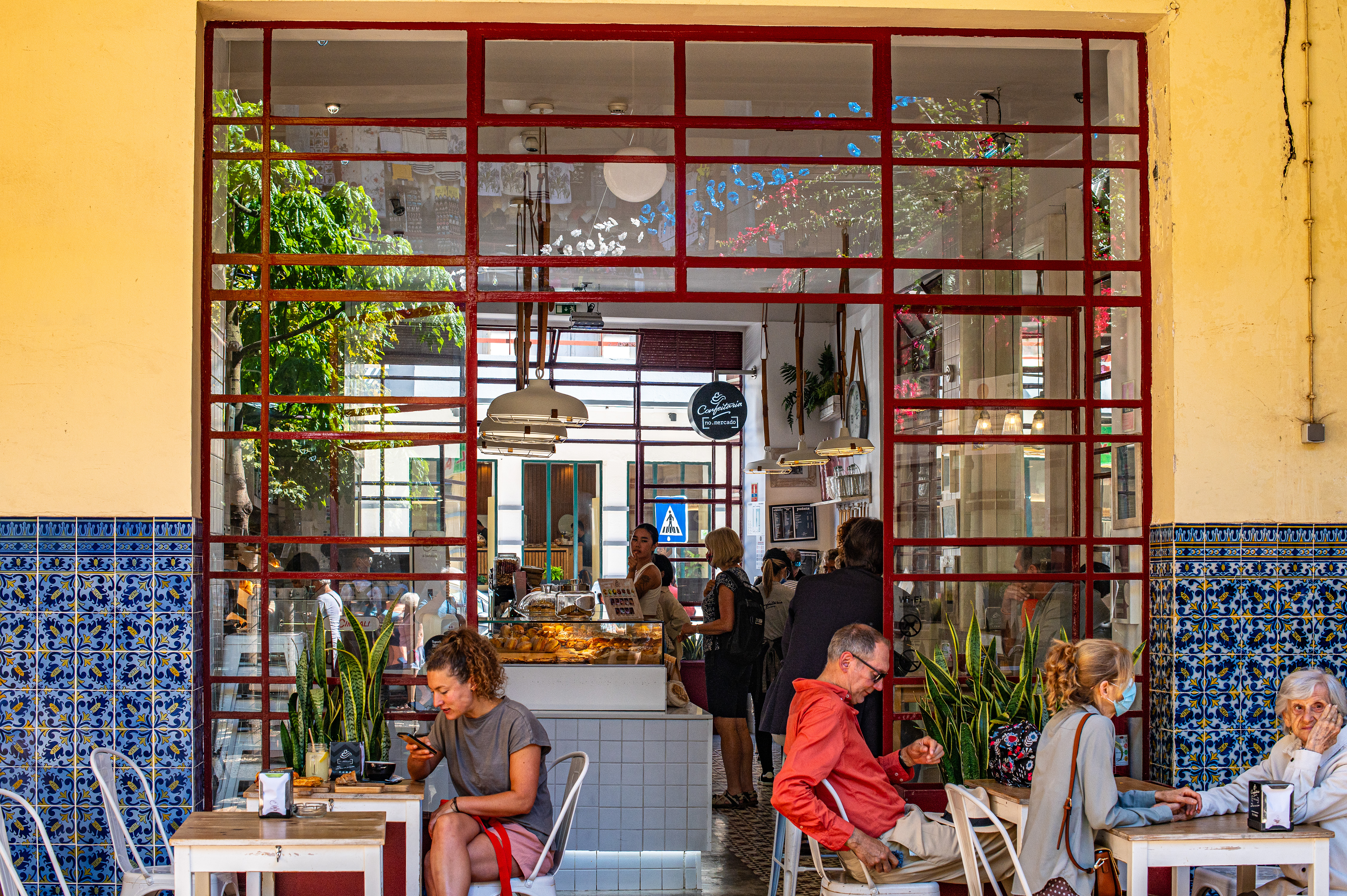 several people are seated at tables
