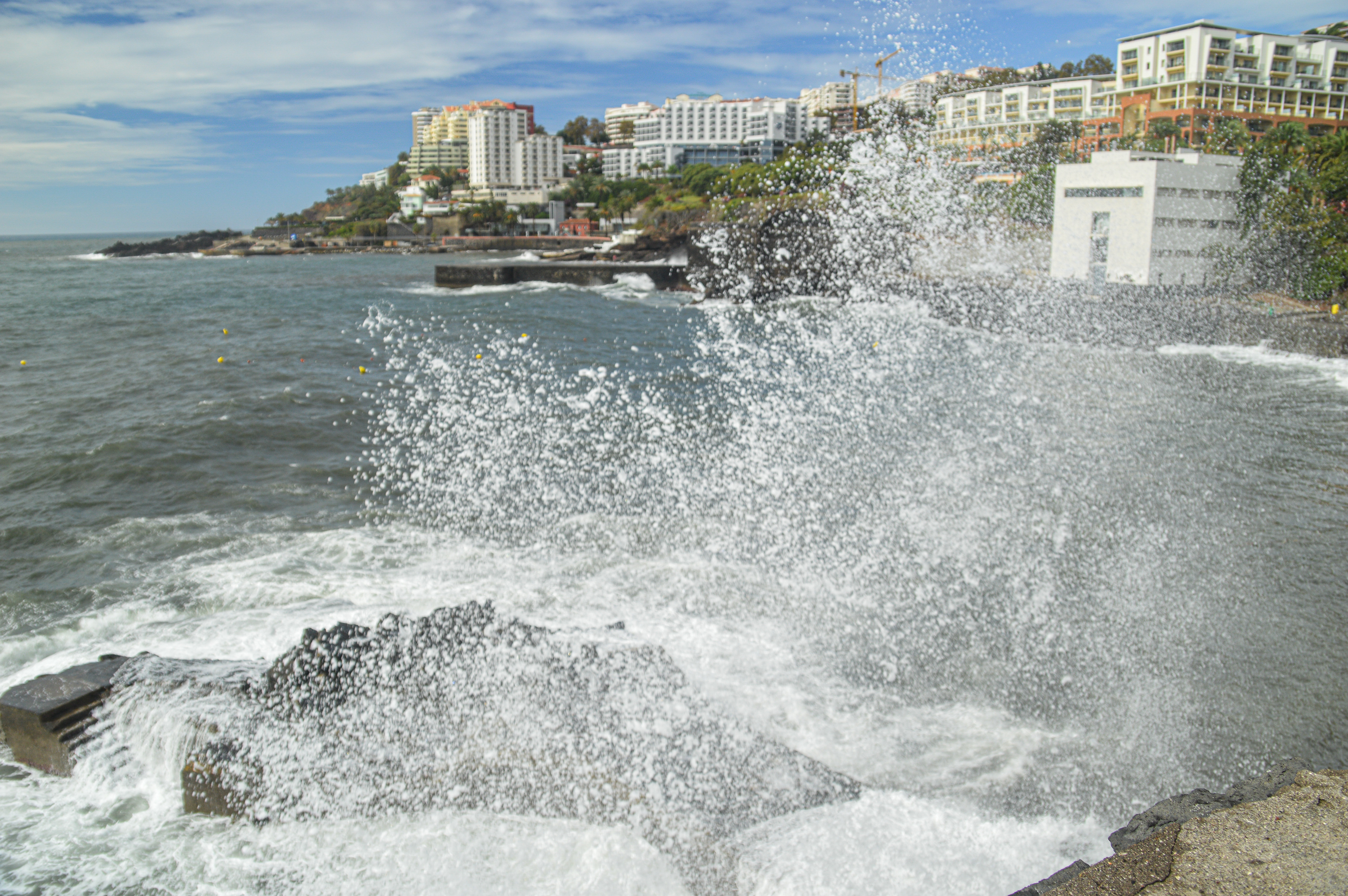 waves crashing against a rocky shore