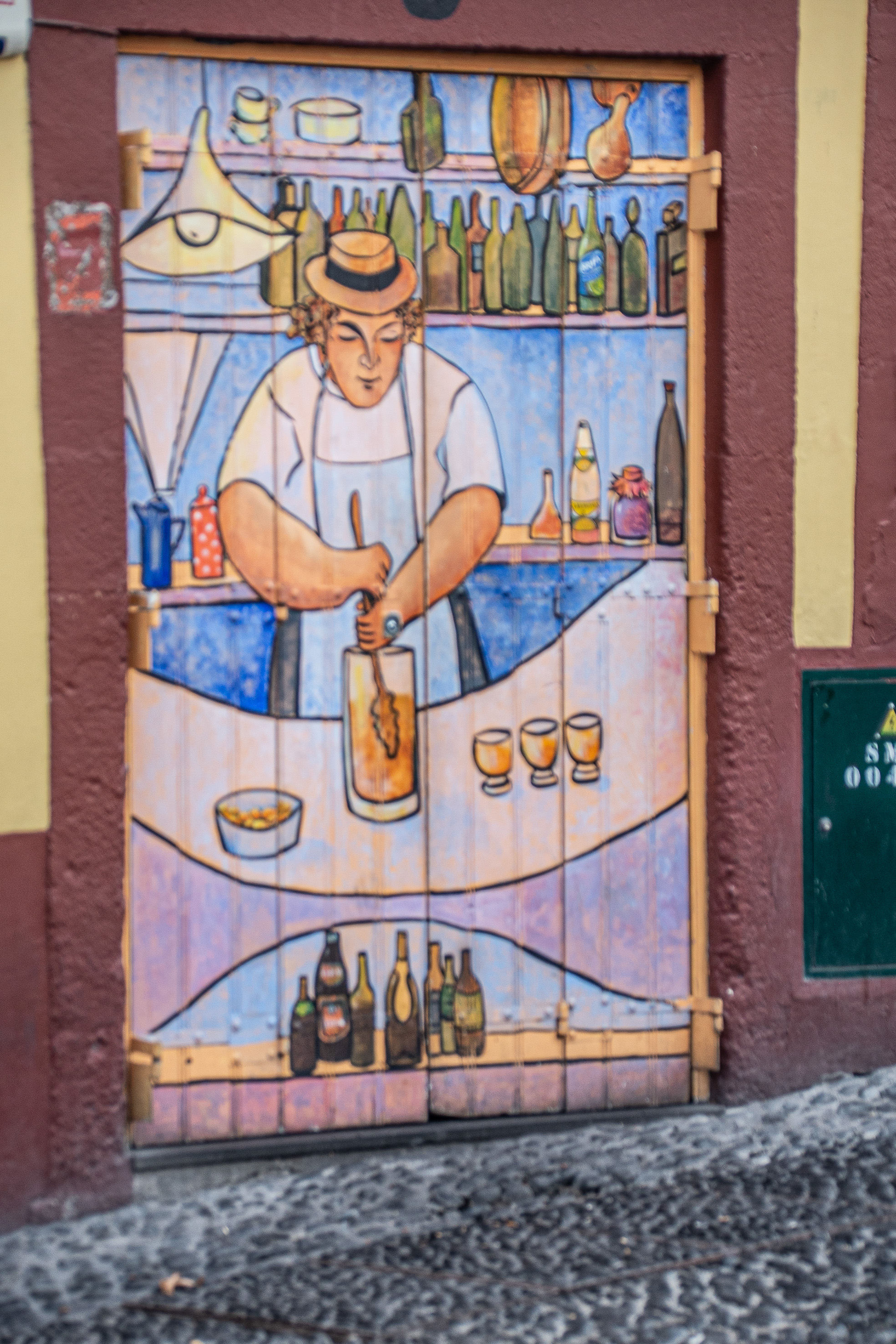 a wooden cabinet with glass doors