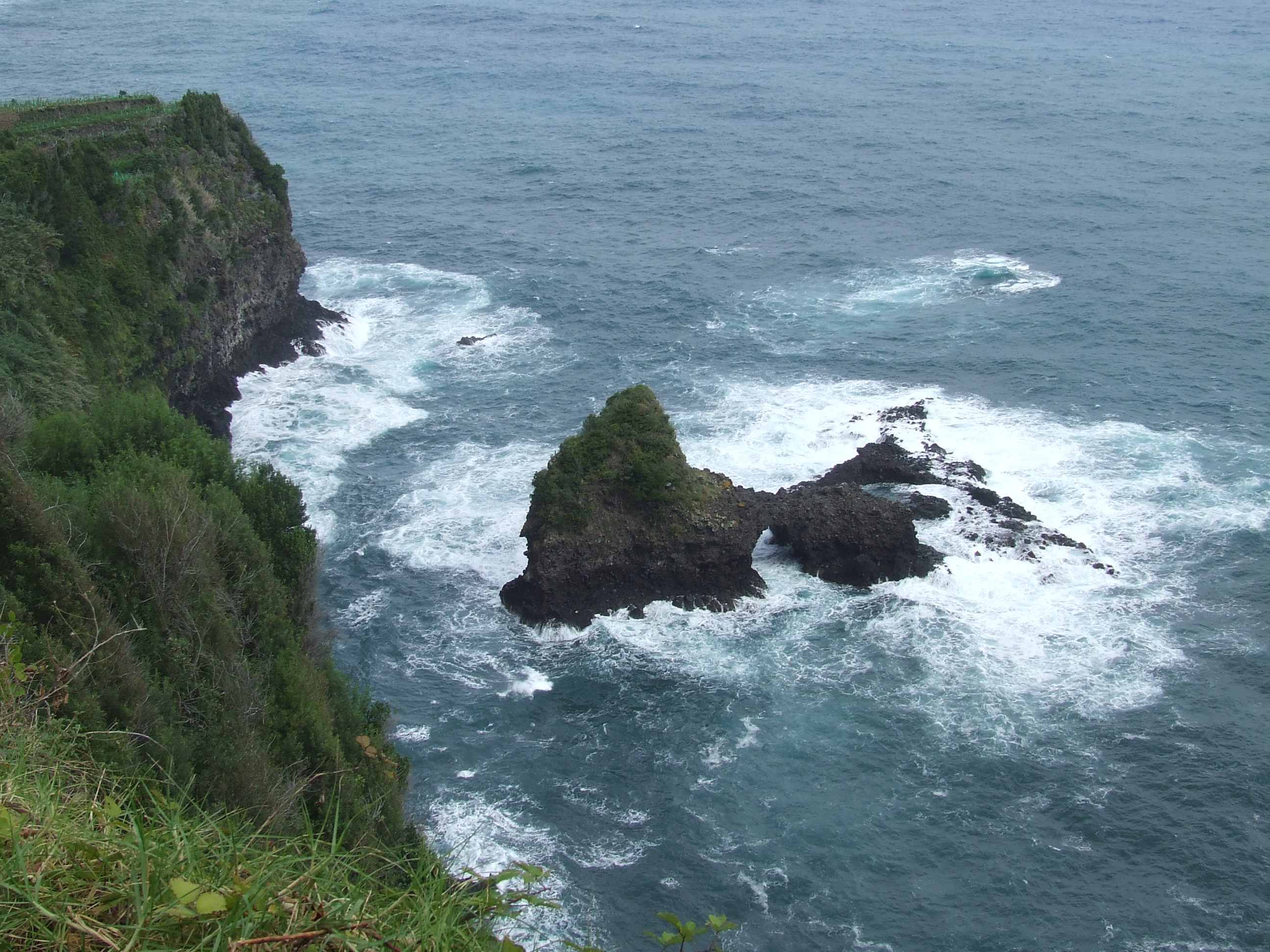 isolated rock formation in the ocean