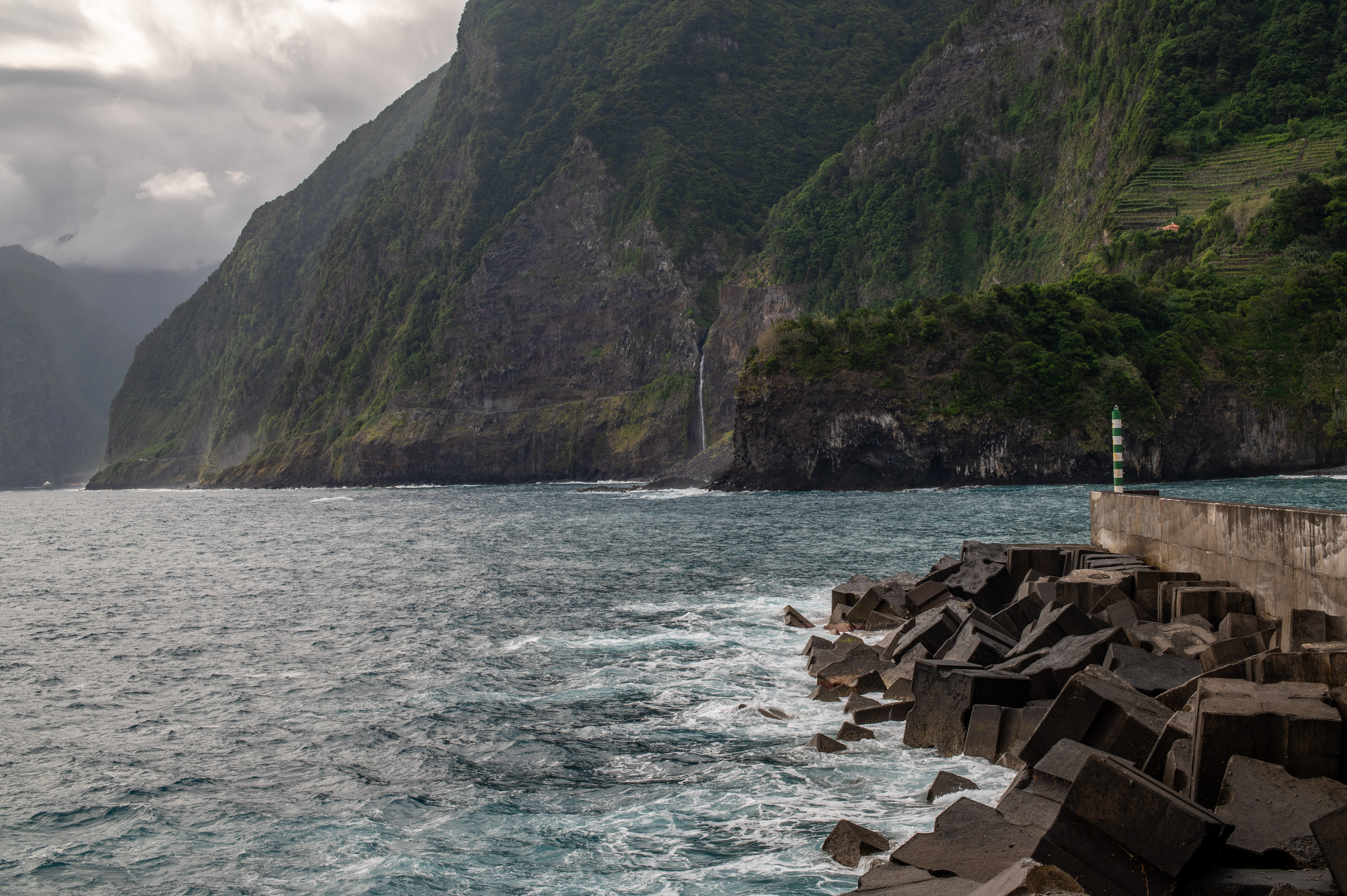 rocky shoreline and a lighthouse