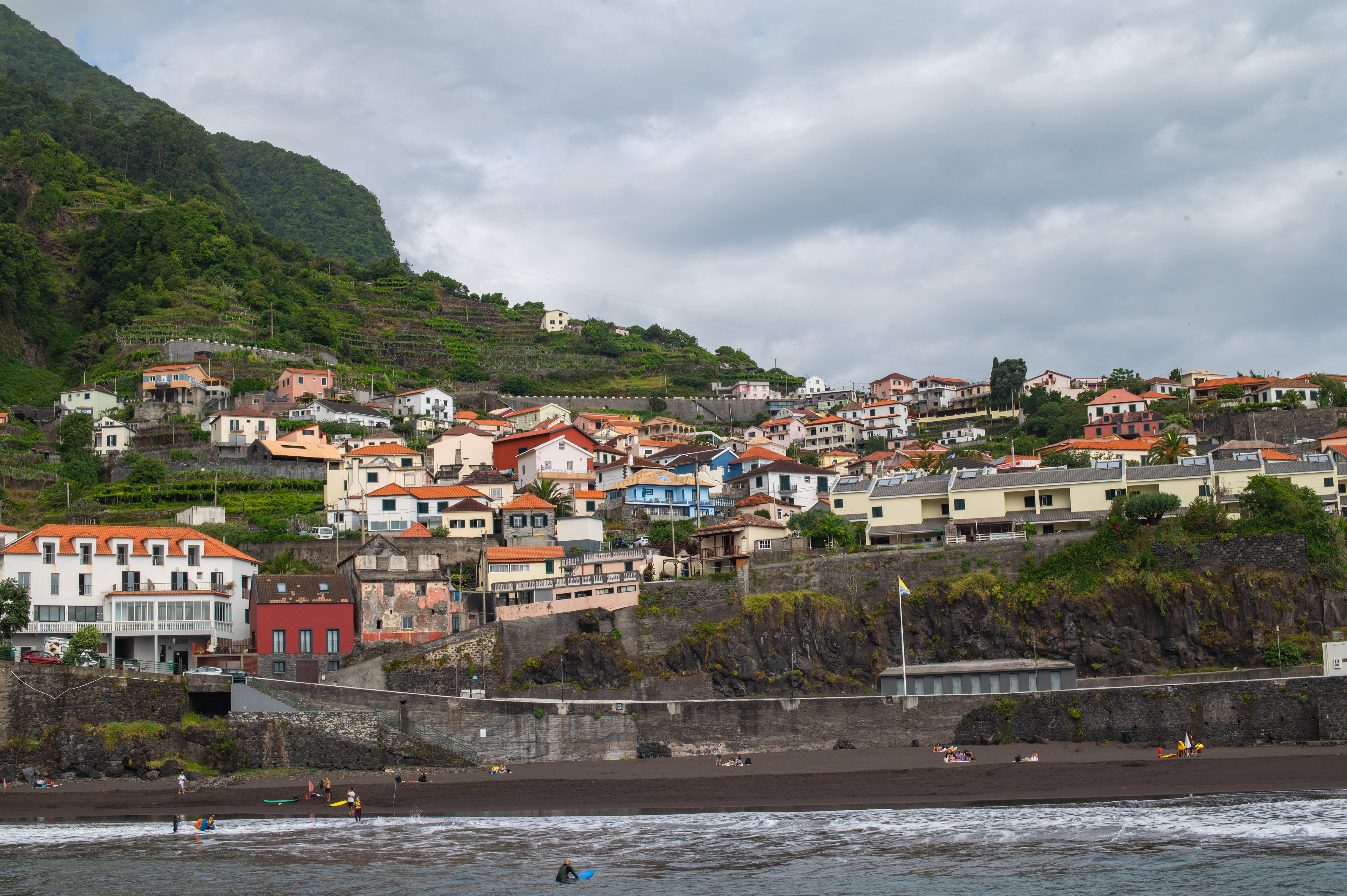 overlooking a black sand beach