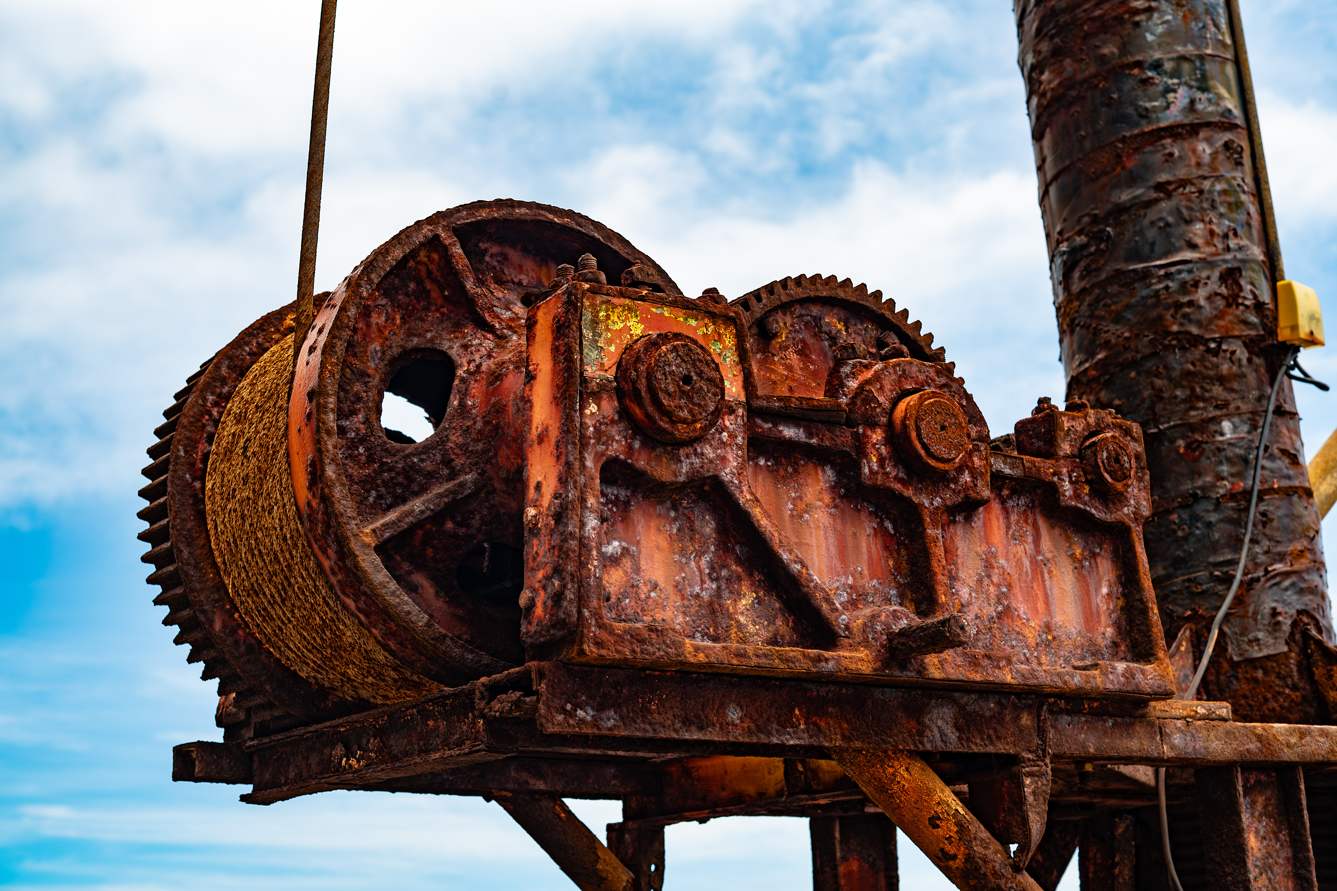 a close-up of an old, rusted mechanical apparatus