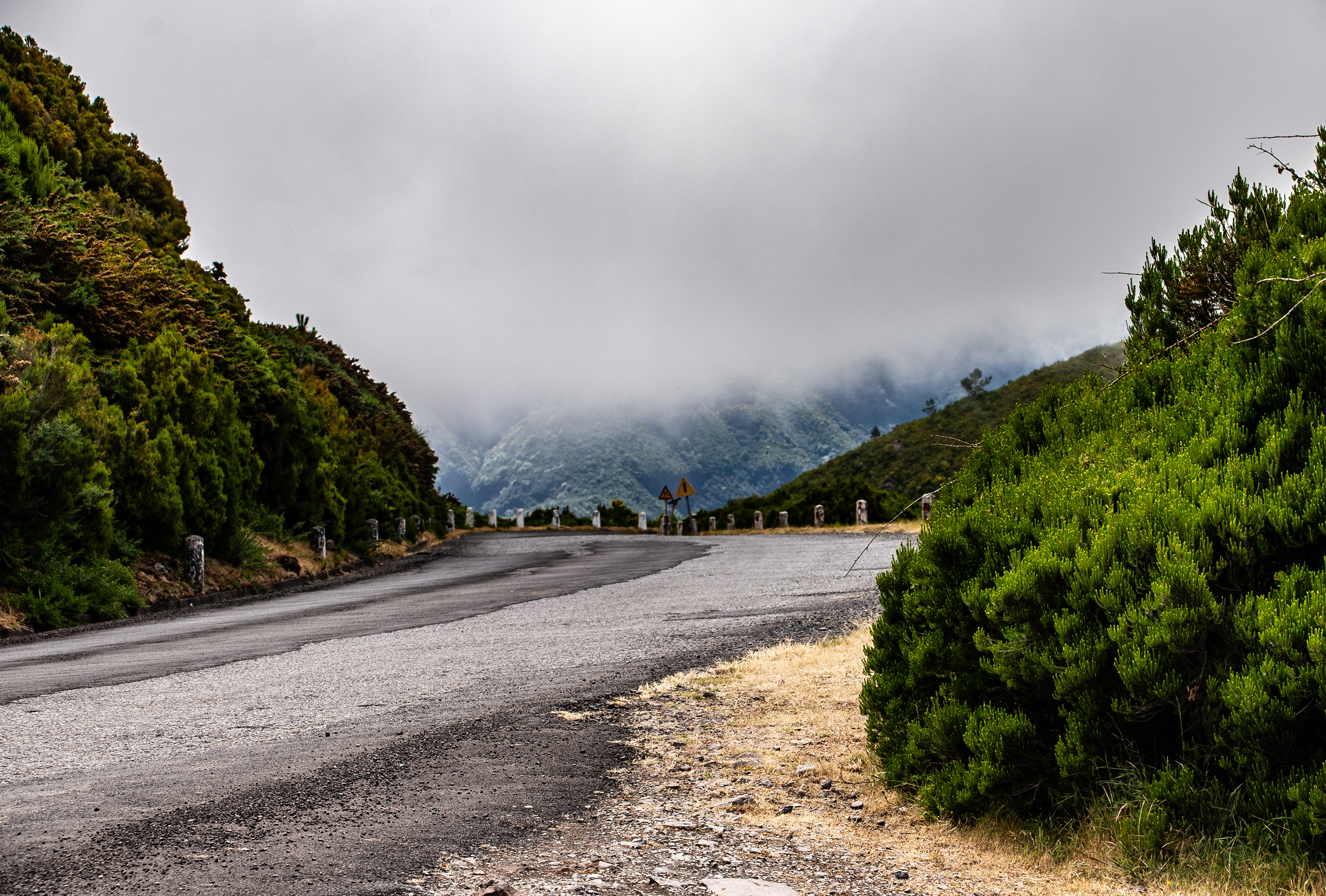 a winding road in a mountainous area