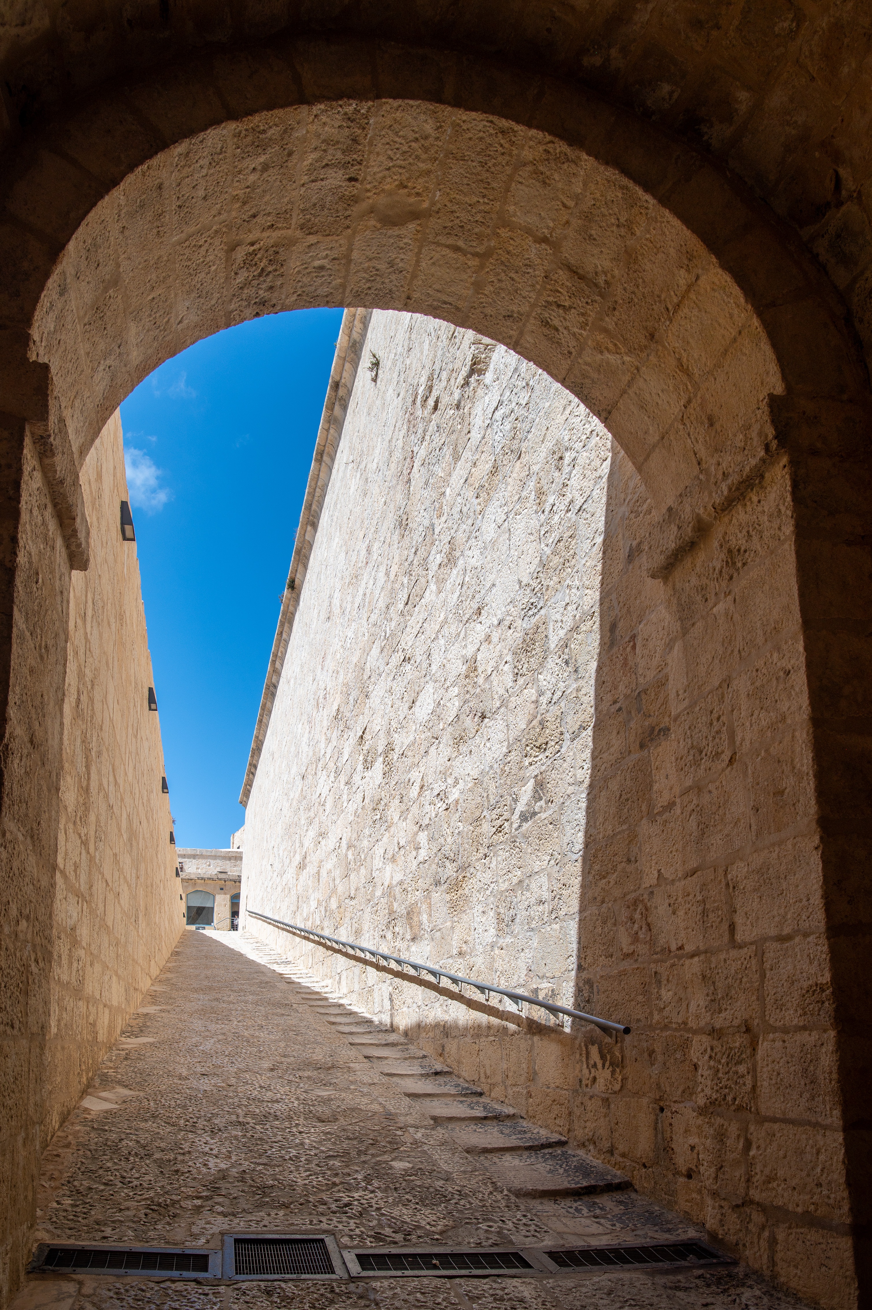 stone pathway framed by an archway