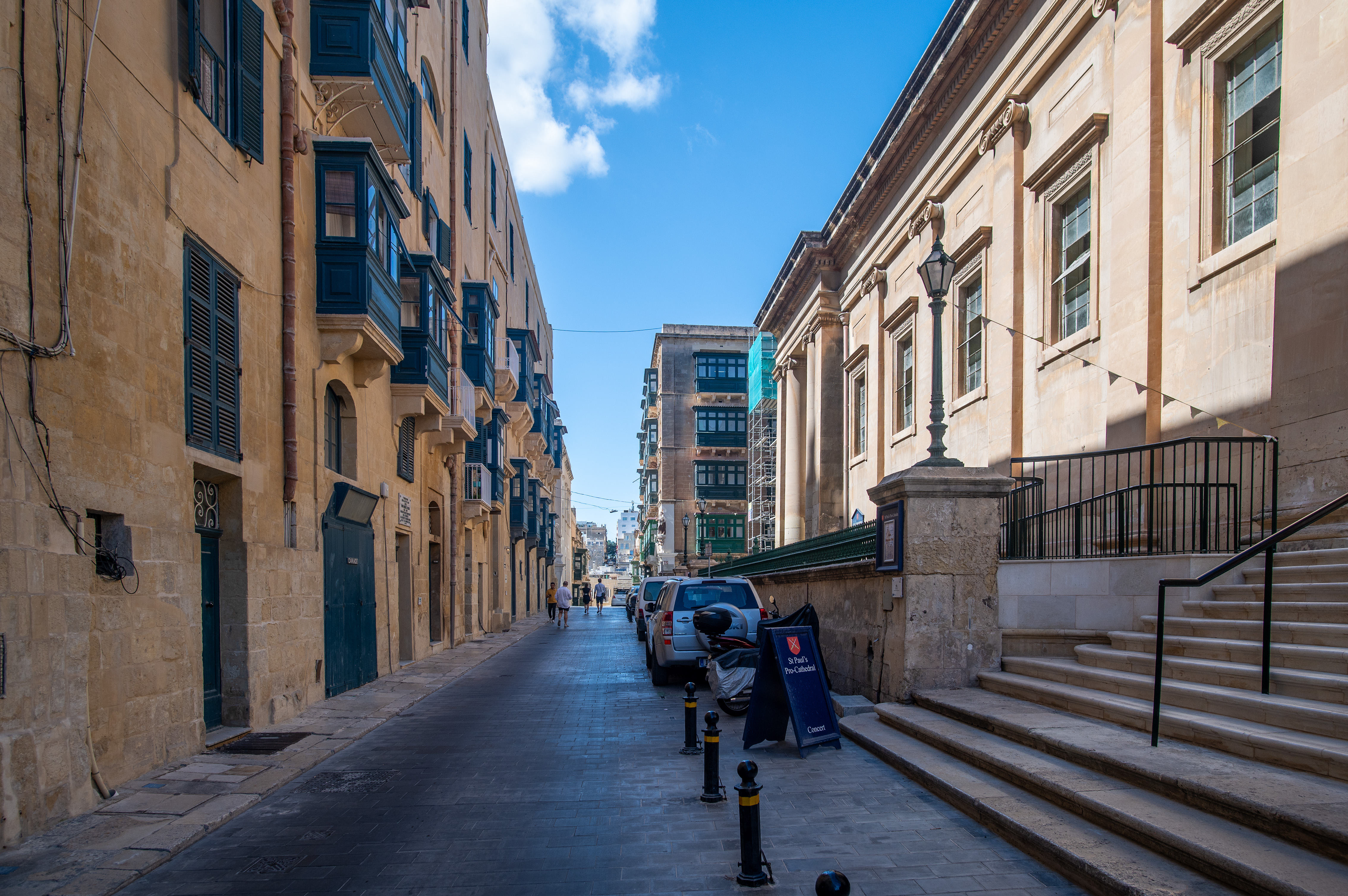 wooden balconies and stone facades
