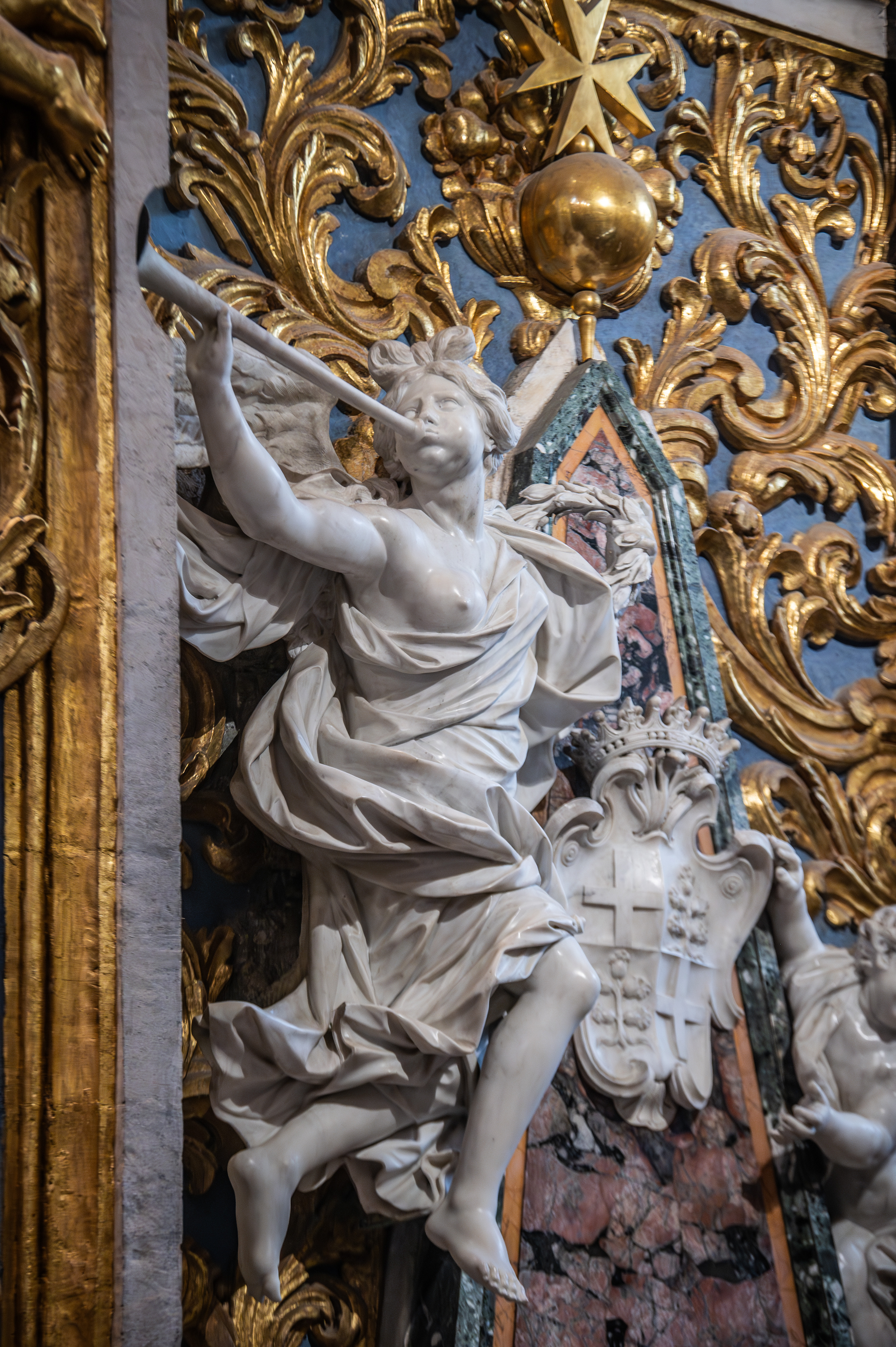 baroque-style sculpture of an angel