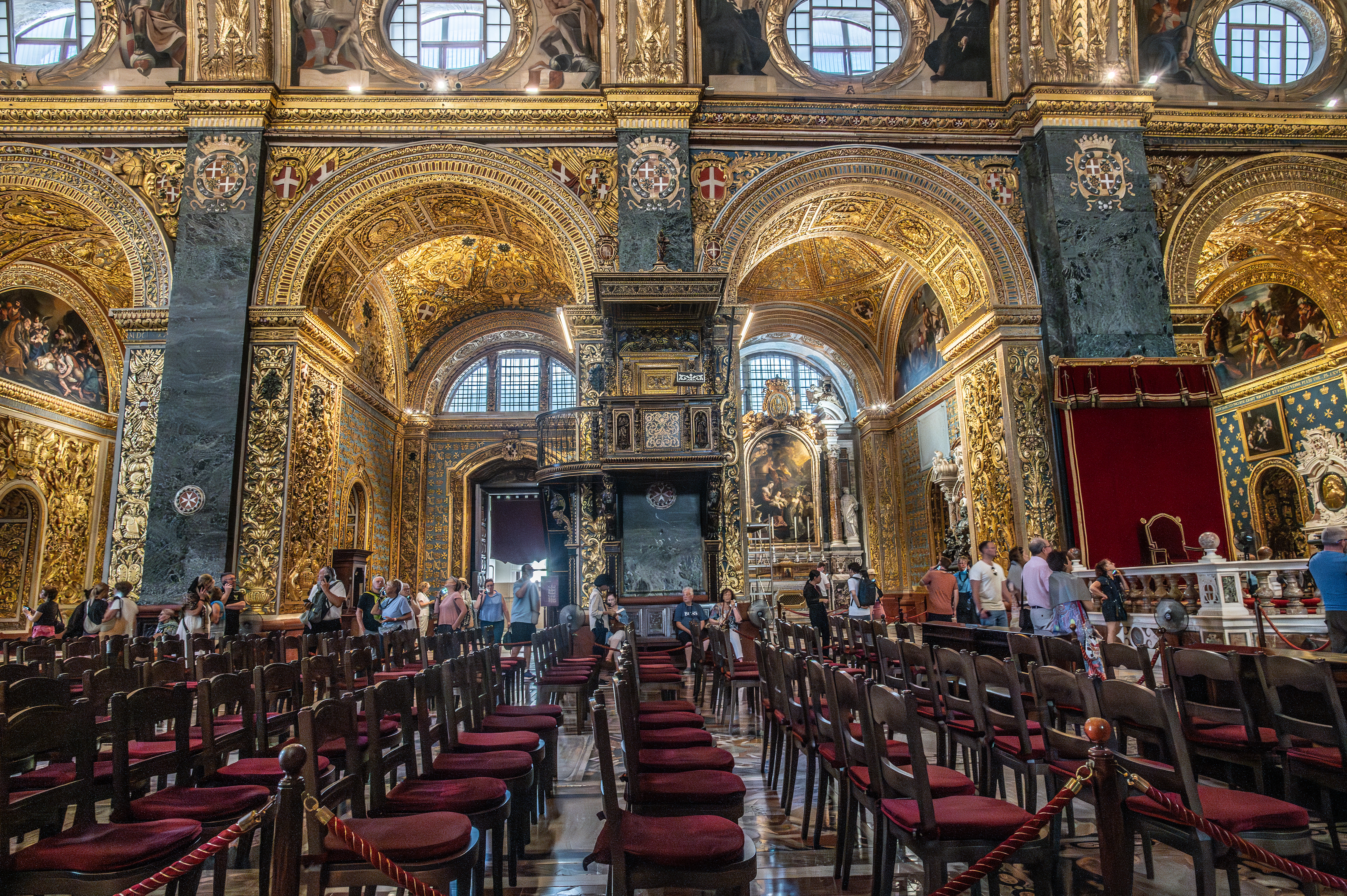 intricate gold detailing, marble columns