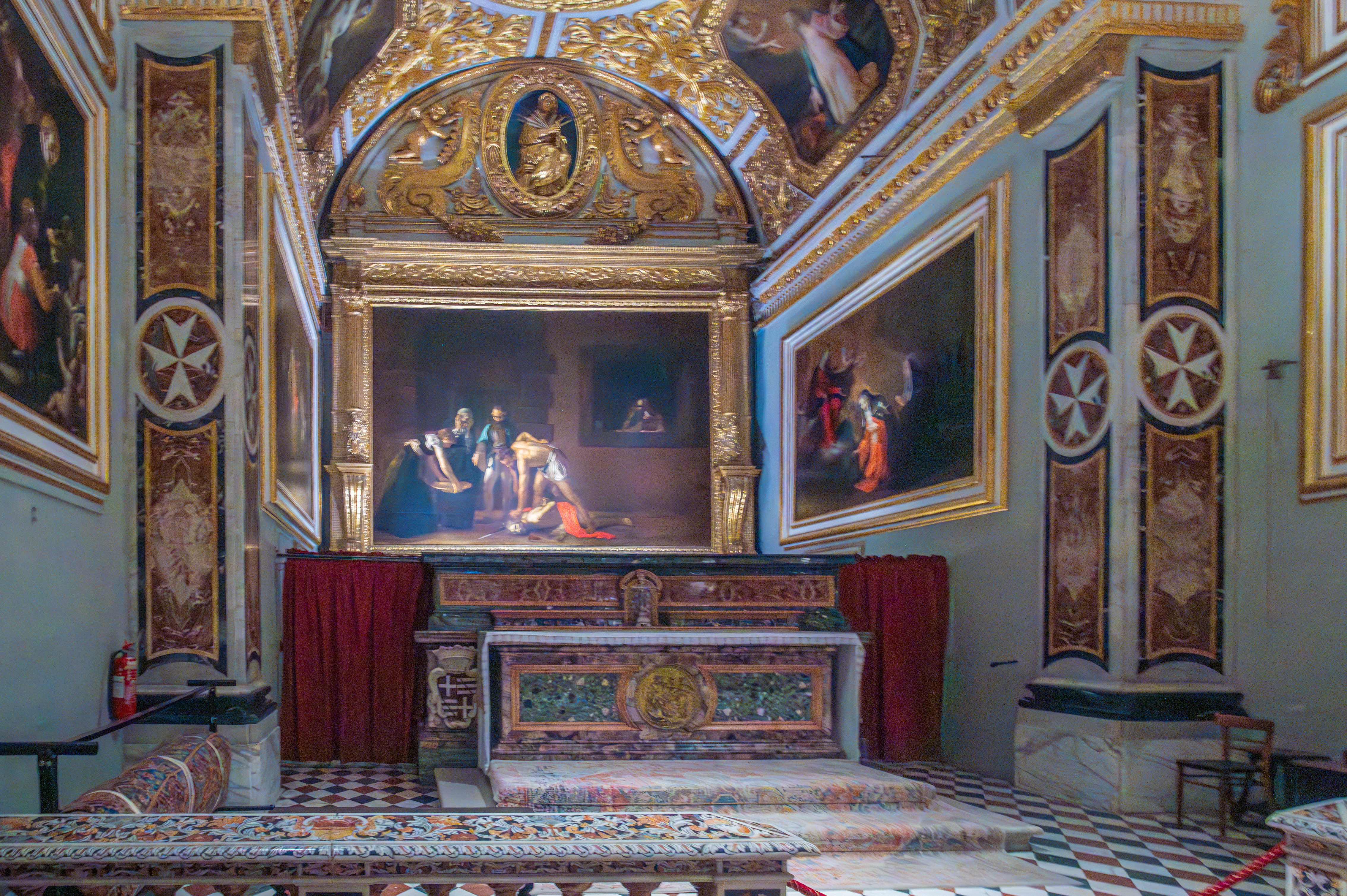 The focal point is an intricately decorated altar