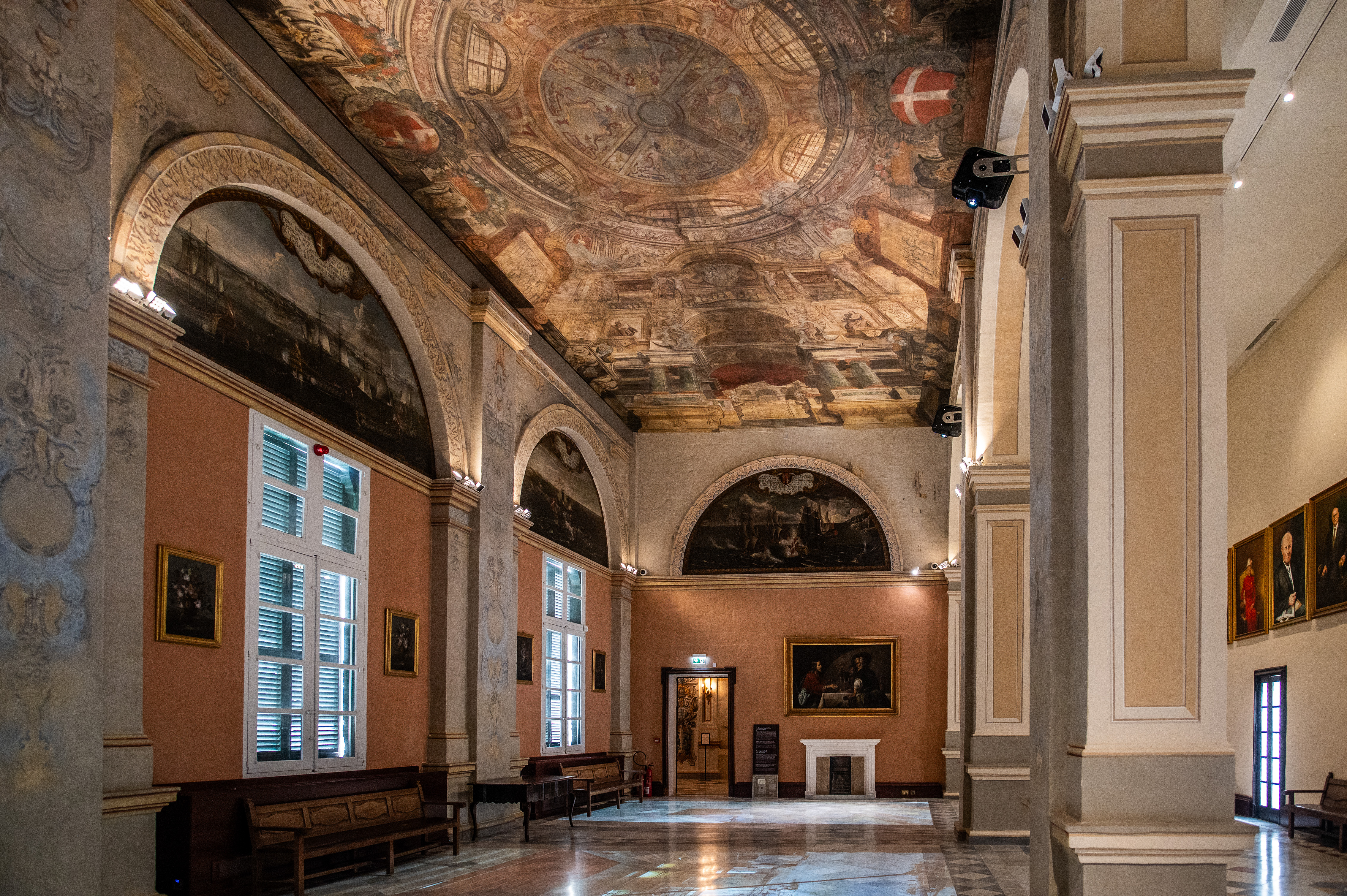 a high, intricately painted ceiling