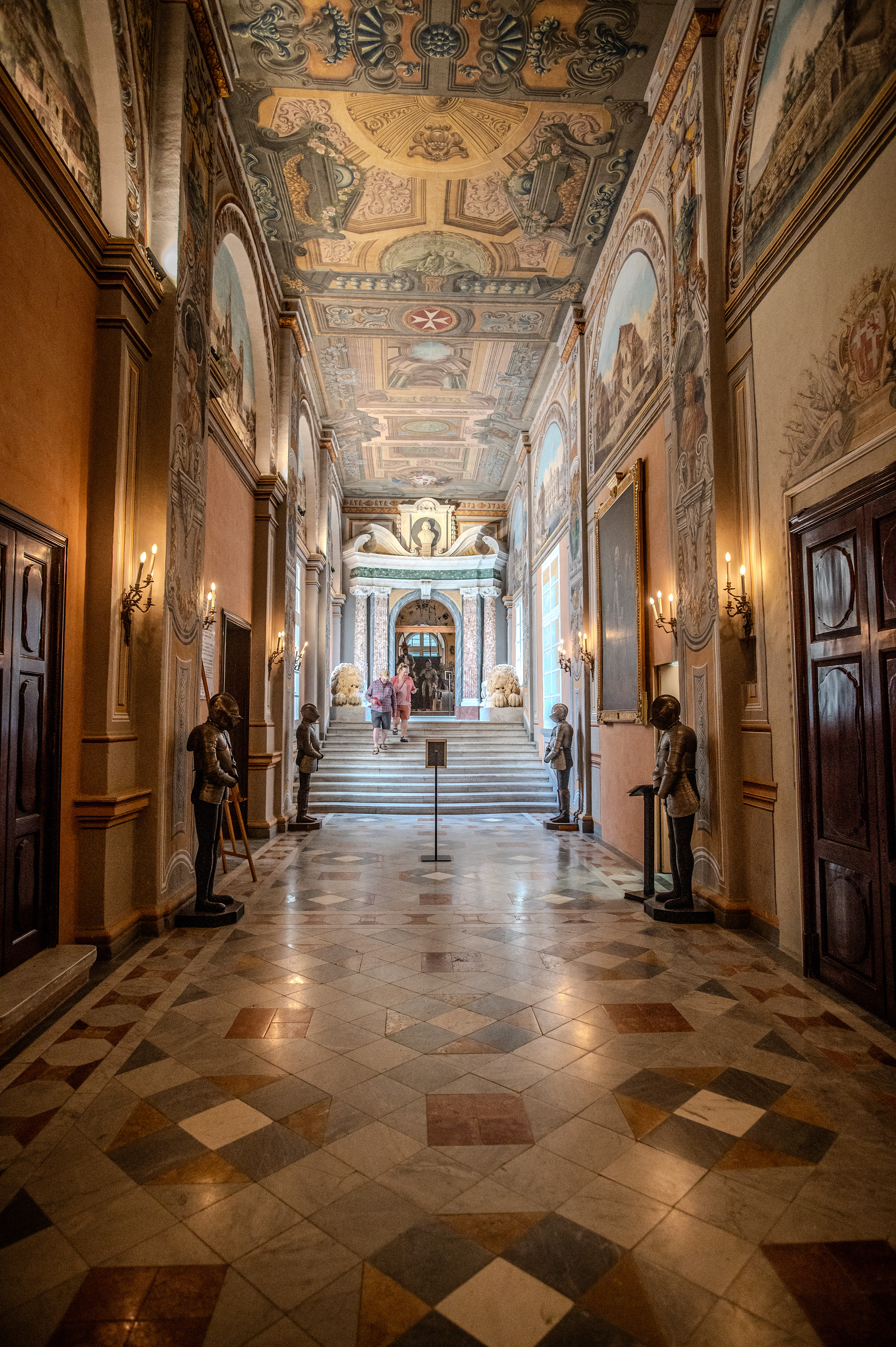 The floor is covered with polished tiles arranged in a geometric pattern