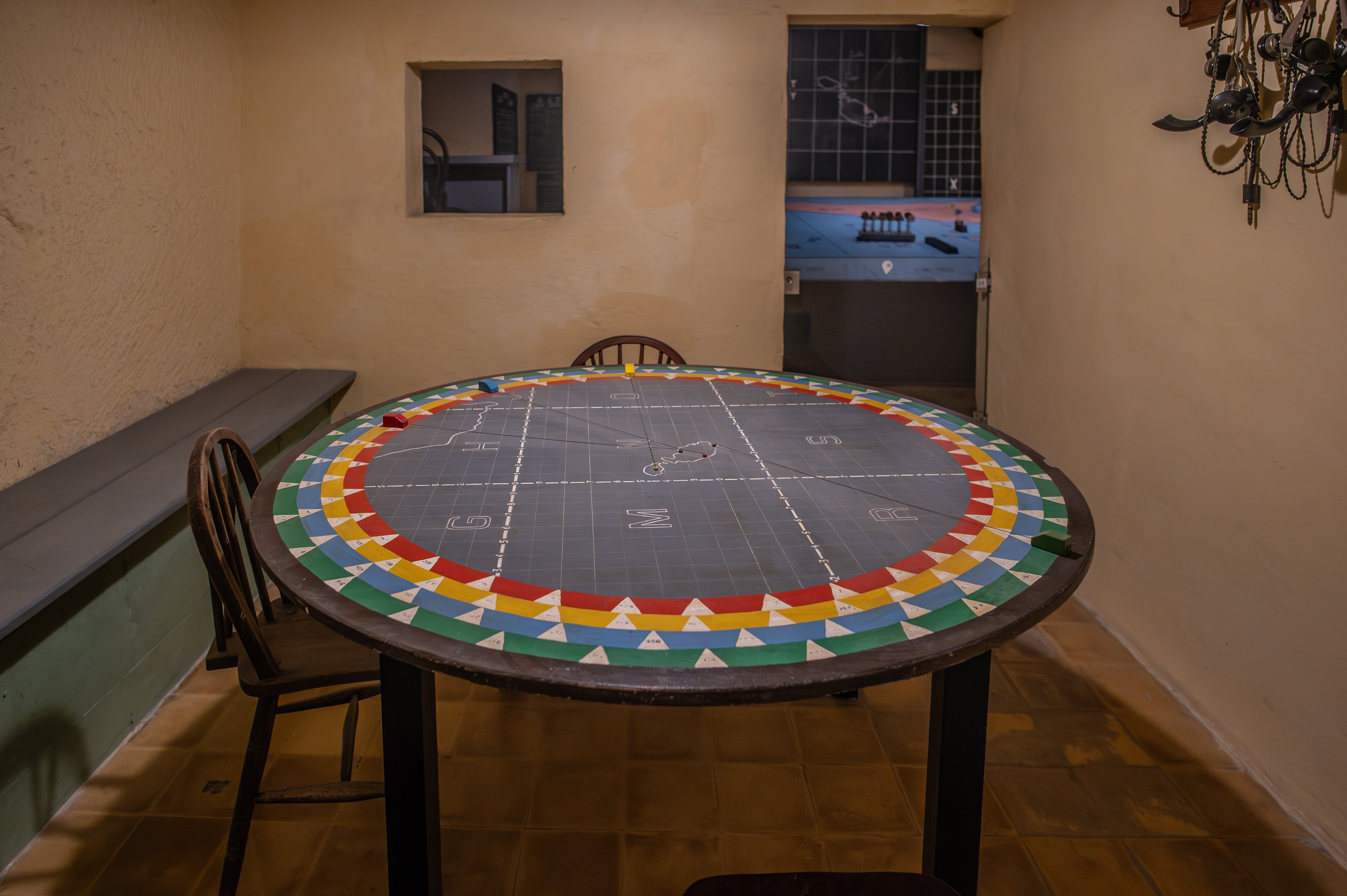 a round table that has a colorful, geometric border