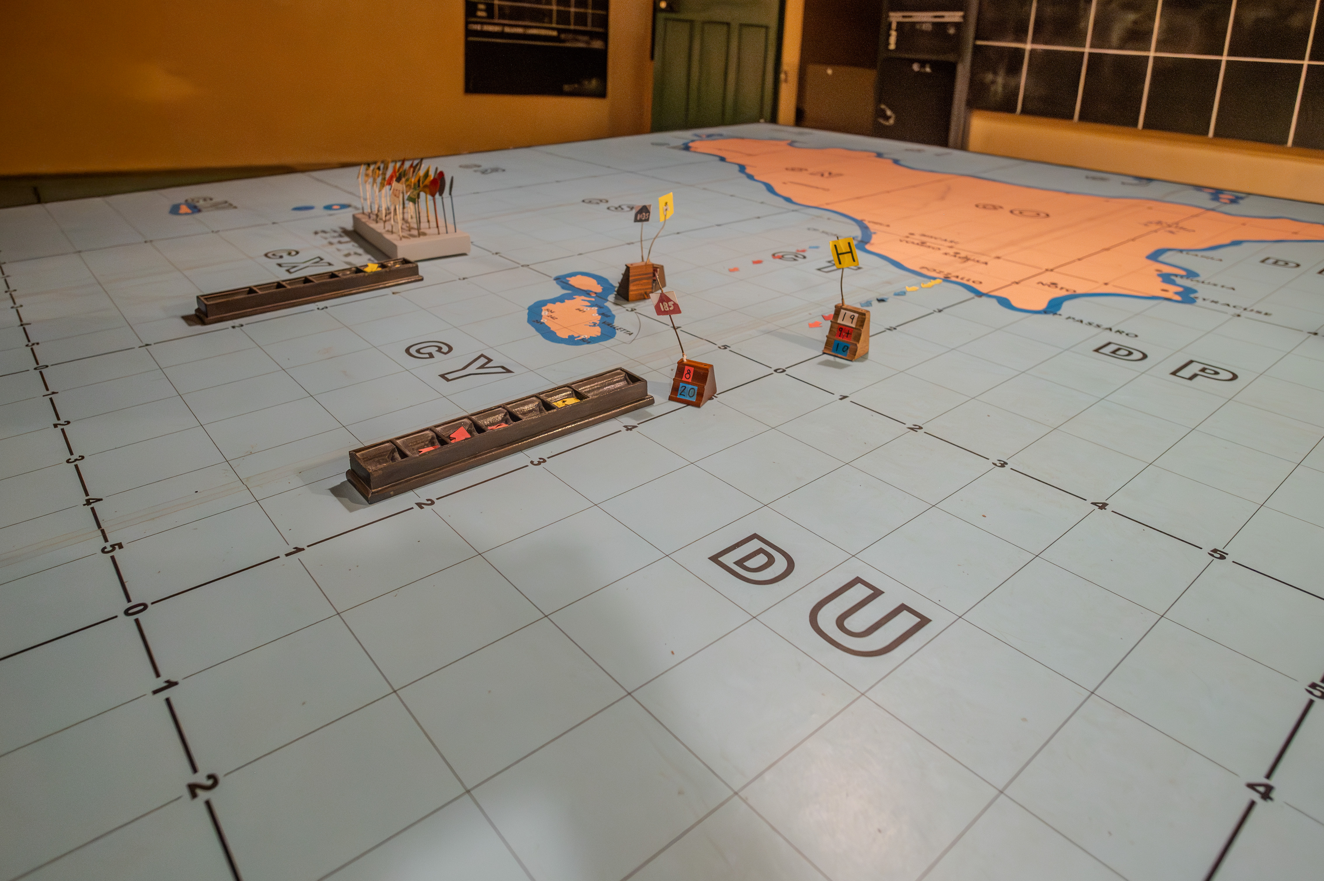strategic war game or simulation setup on a large, detailed map
