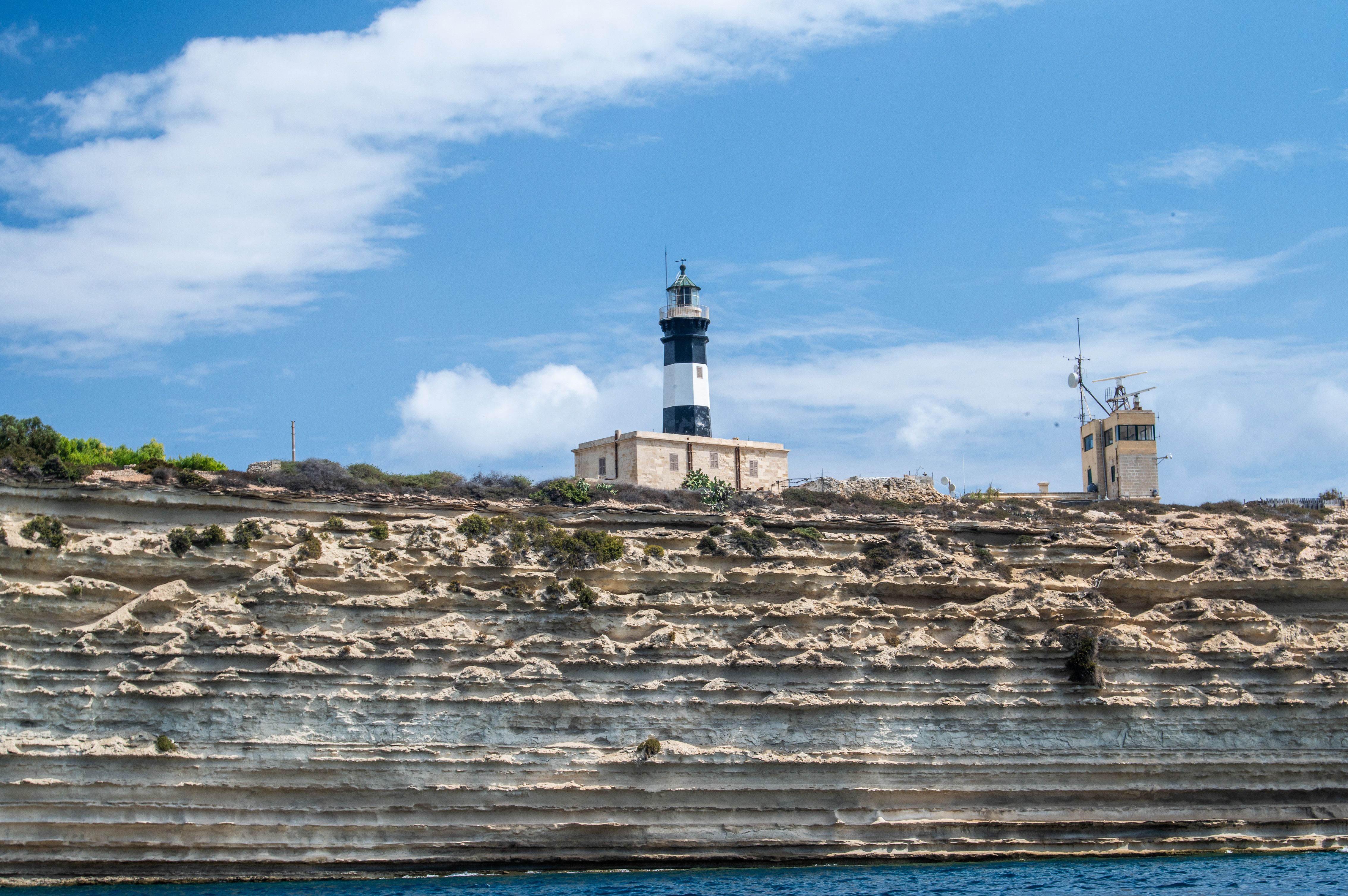 a lighthouse situated on a cliff