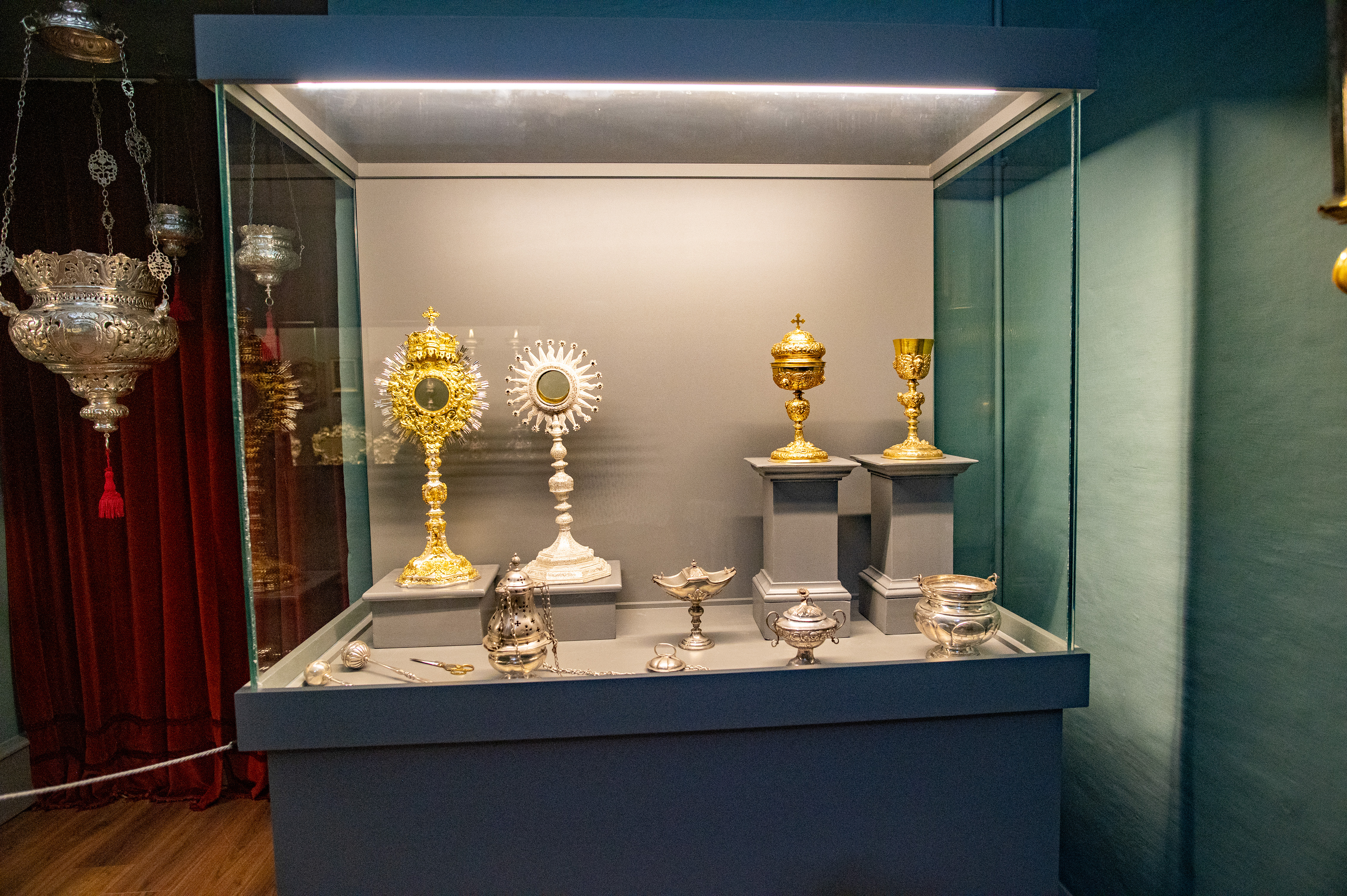 display case containing various religious artifacts
