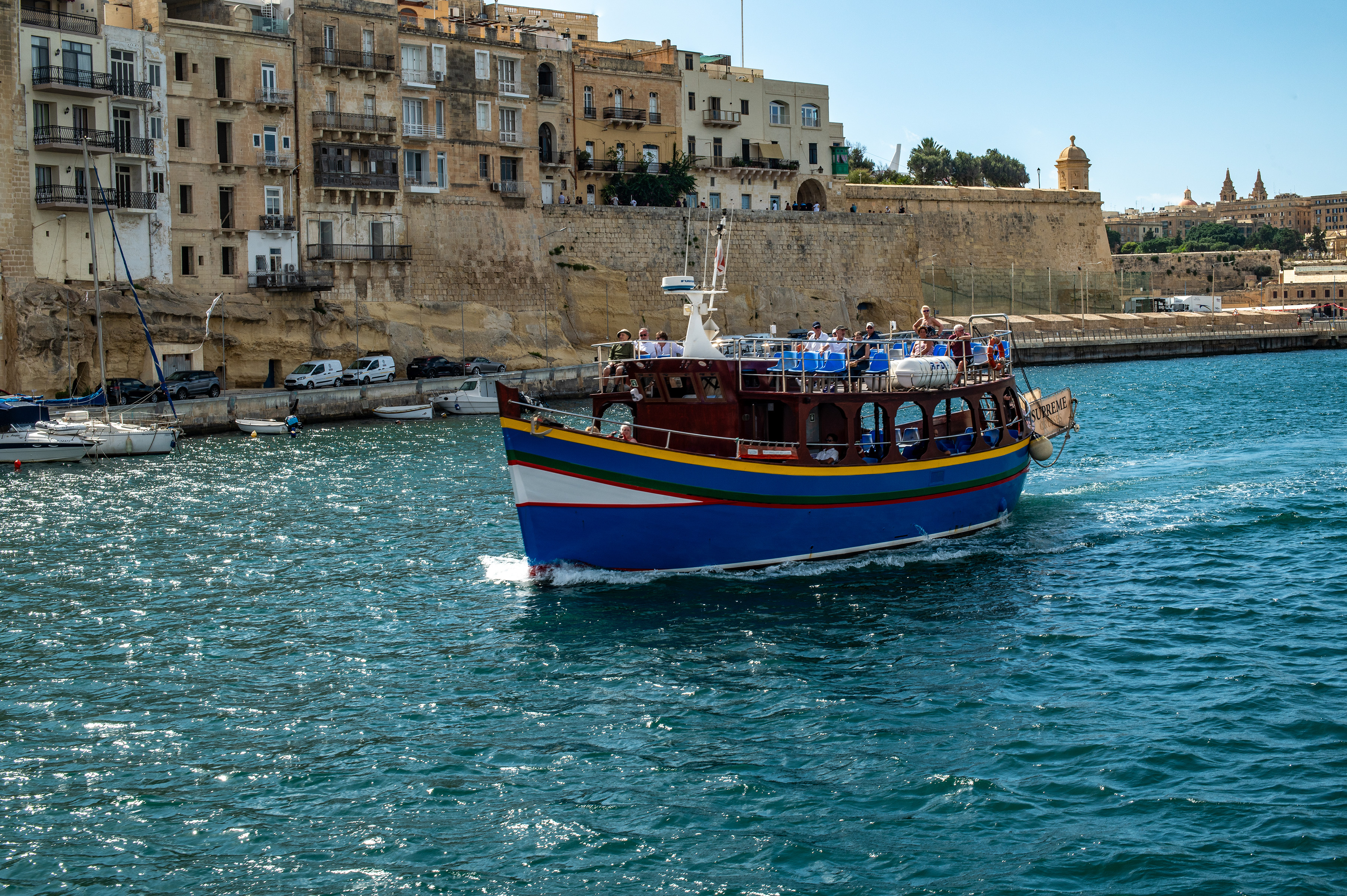 a colorful boat with passengers