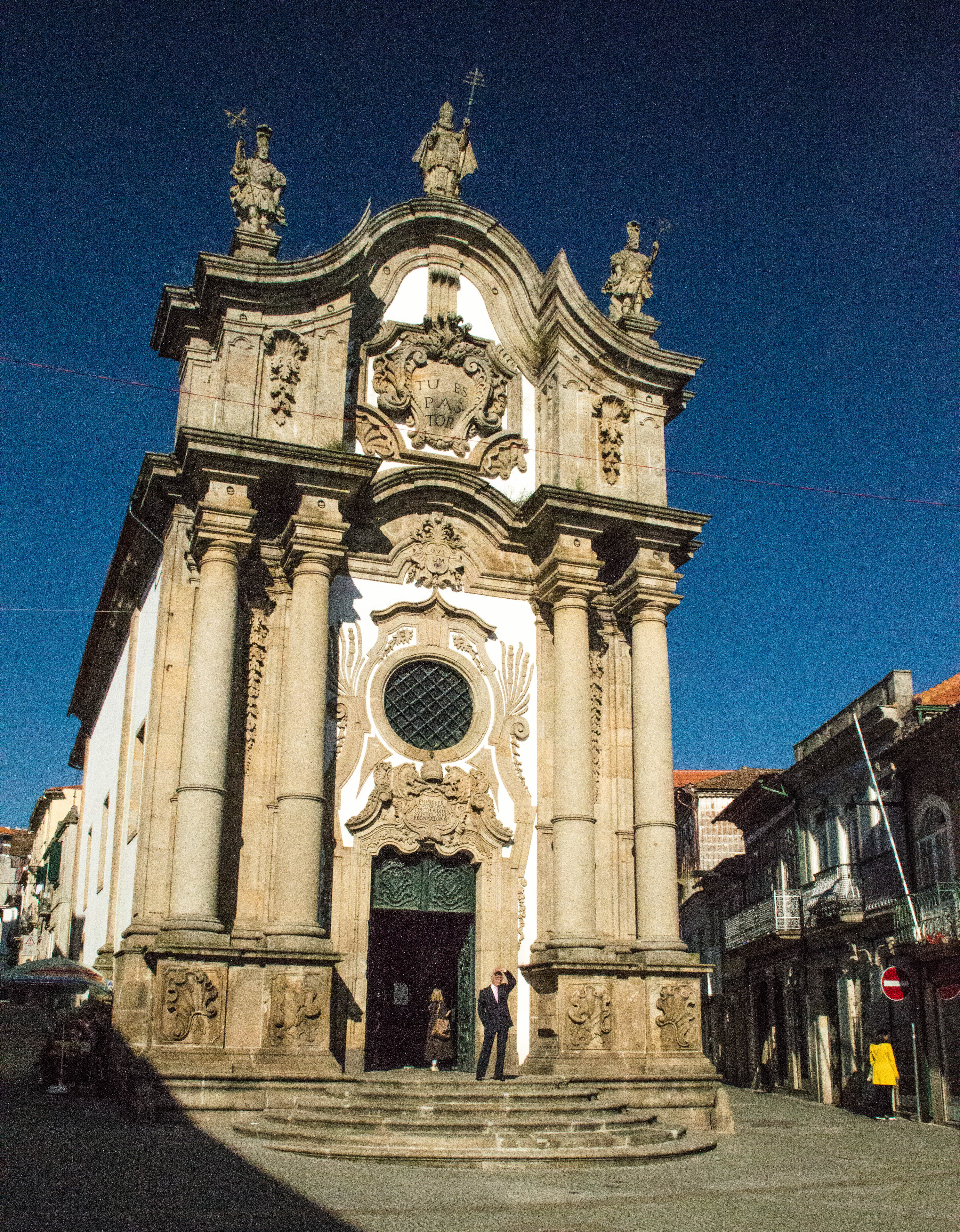ornate church facade with intricate architectural details and statues