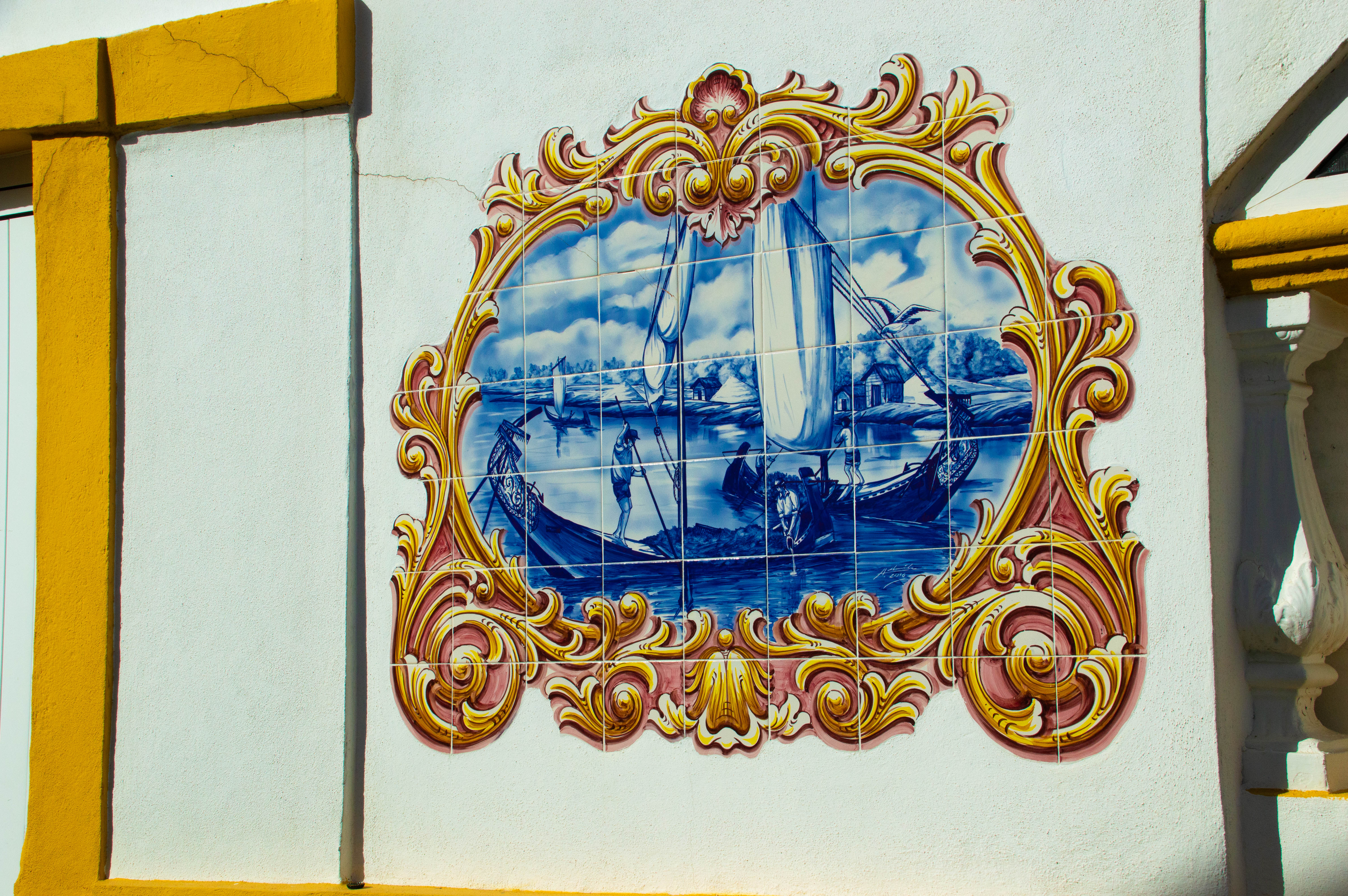 a decorative tile artwork mounted on a wall