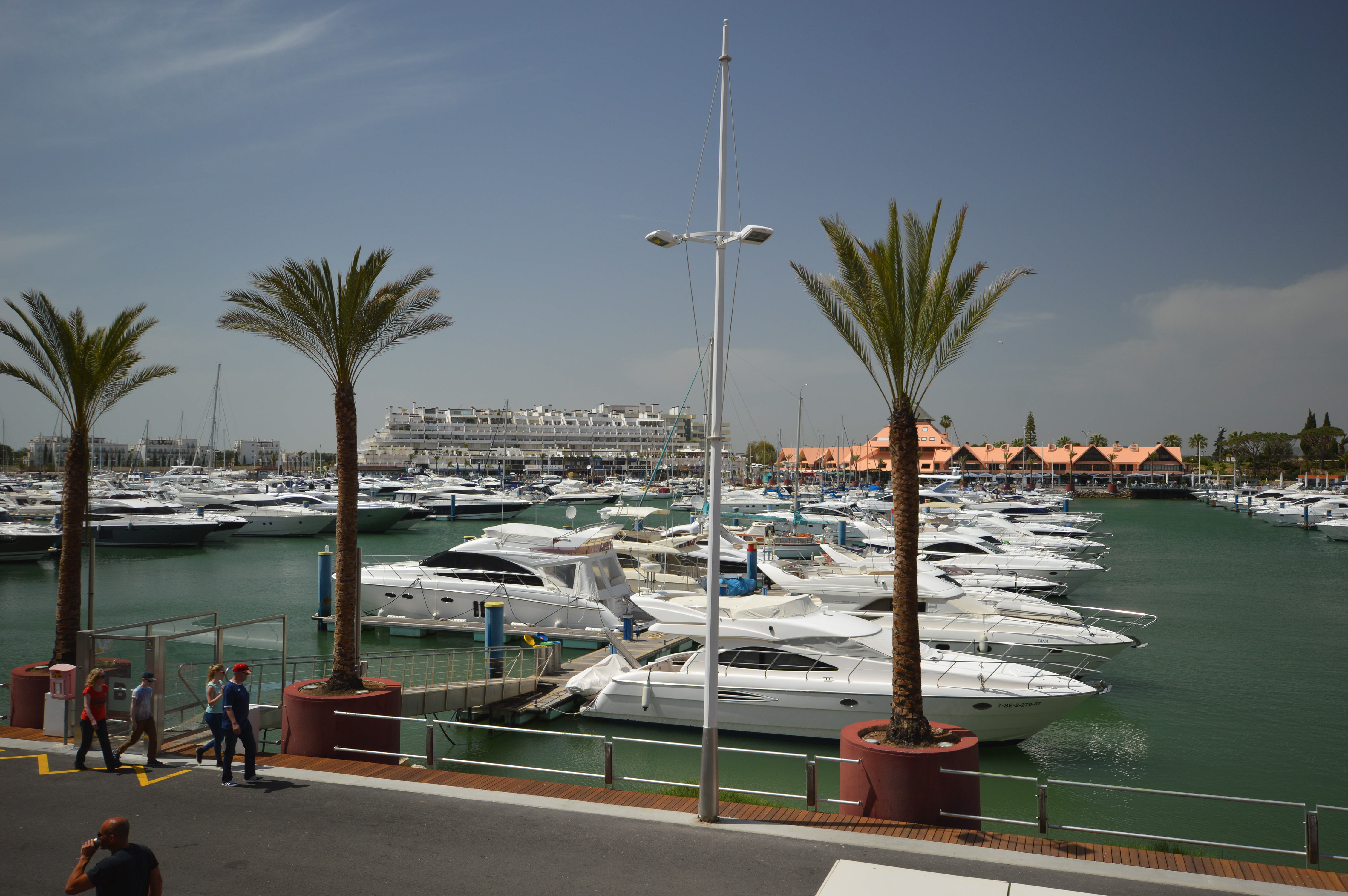 a marina filled with various yachts and boats