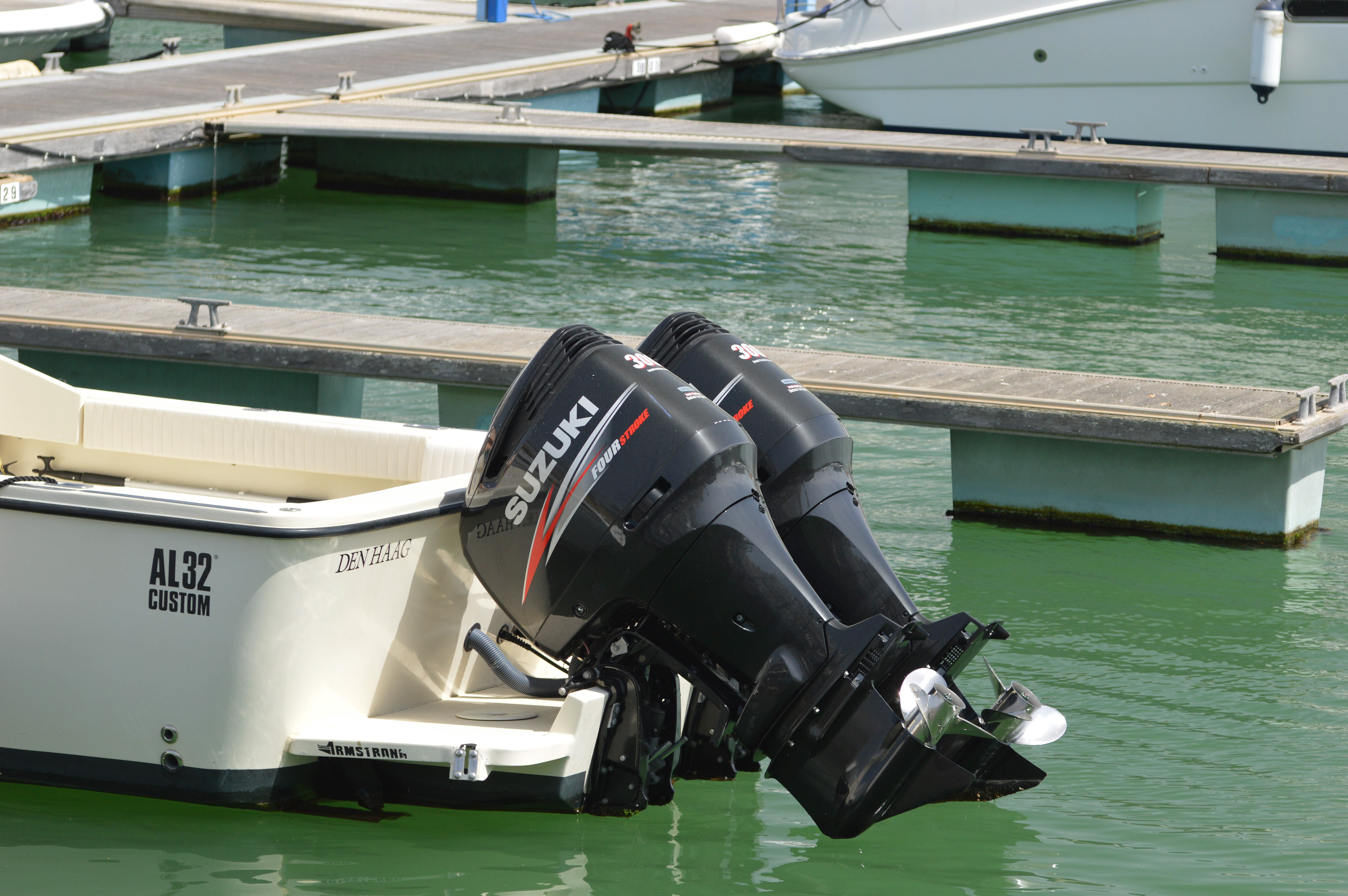 boats and yachts docked at piers