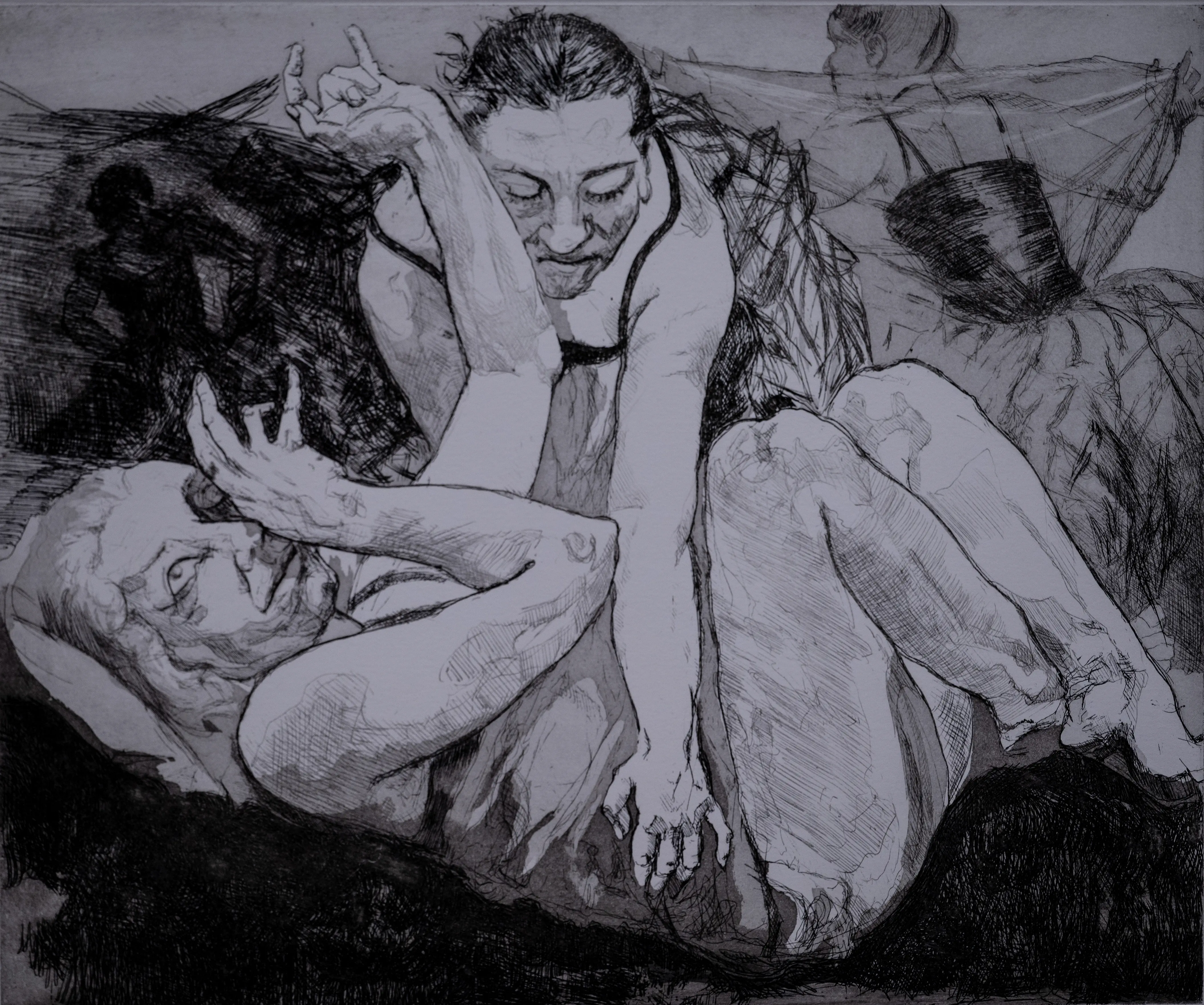 An etching of two figures embracing intimately, with one figure leaning over another. The style is line-based and emotive, with visible artist's signature and edition details.