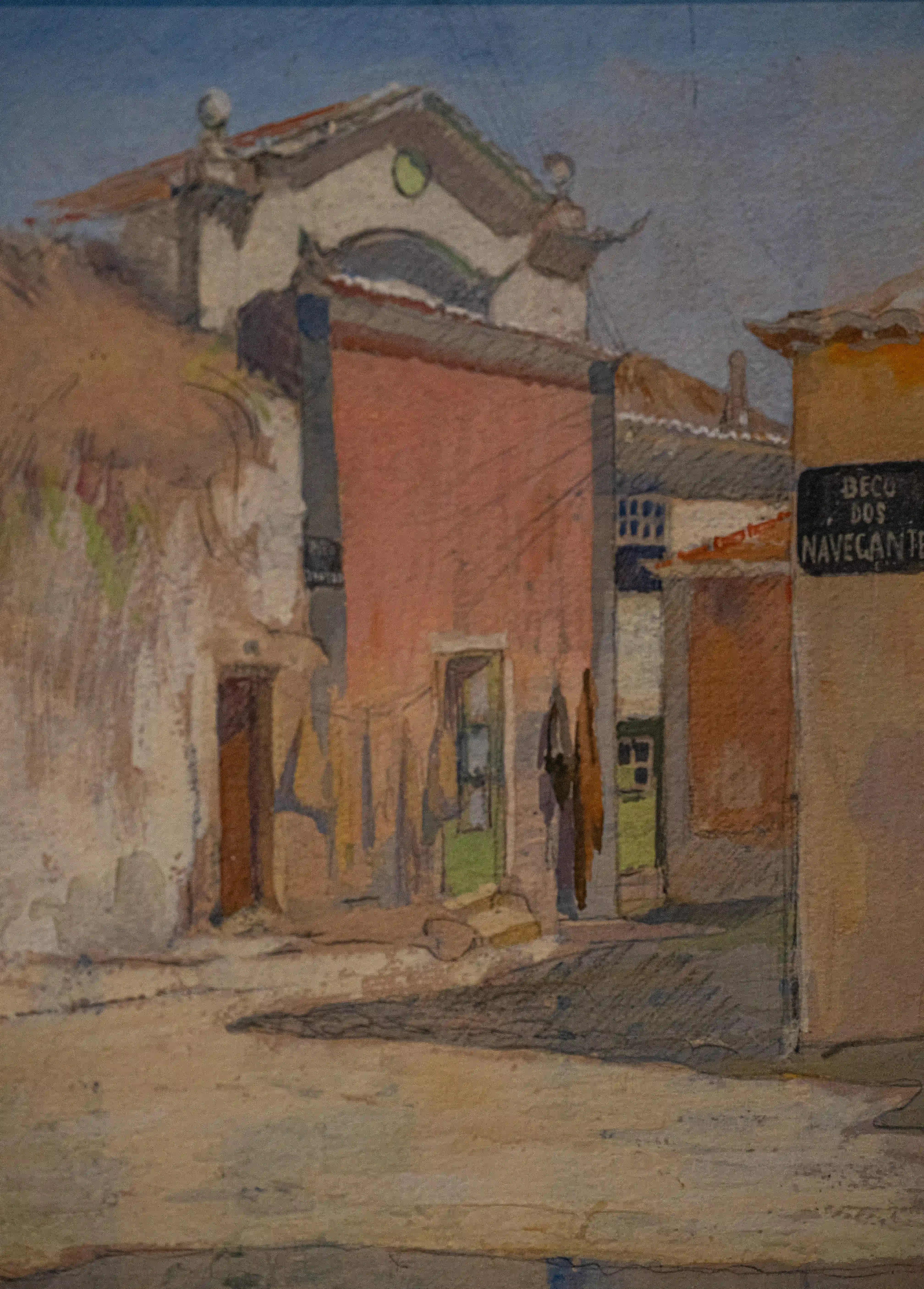  Painting of a narrow street with salmon-pink and beige buildings. A black sign on the right reads 'BECO DOS NAVEGANTES'.