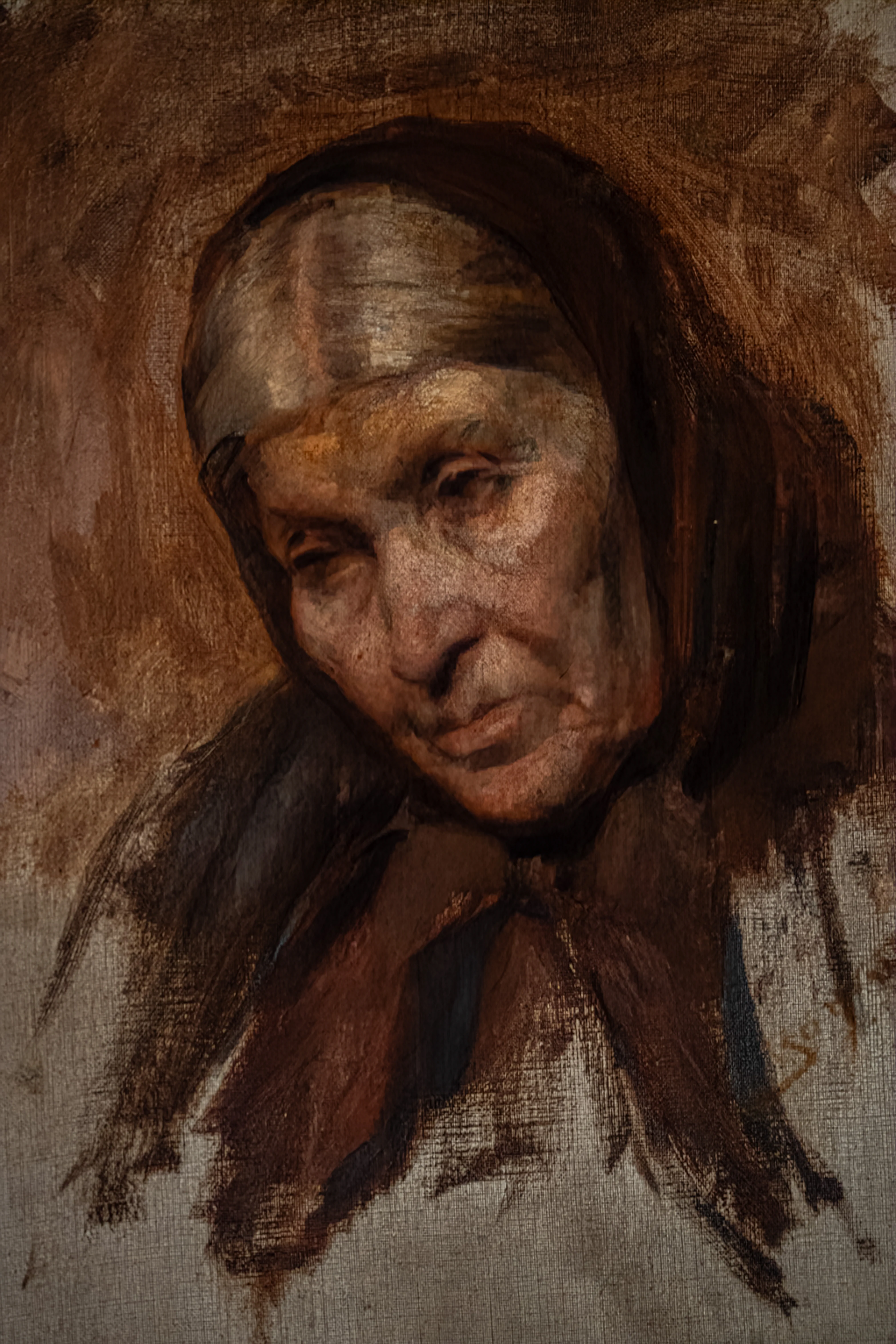 Oil painting of an elderly woman's head and shoulders, looking downwards with a thoughtful expression. The painting is in shades of brown and grey, with visible canvas texture.