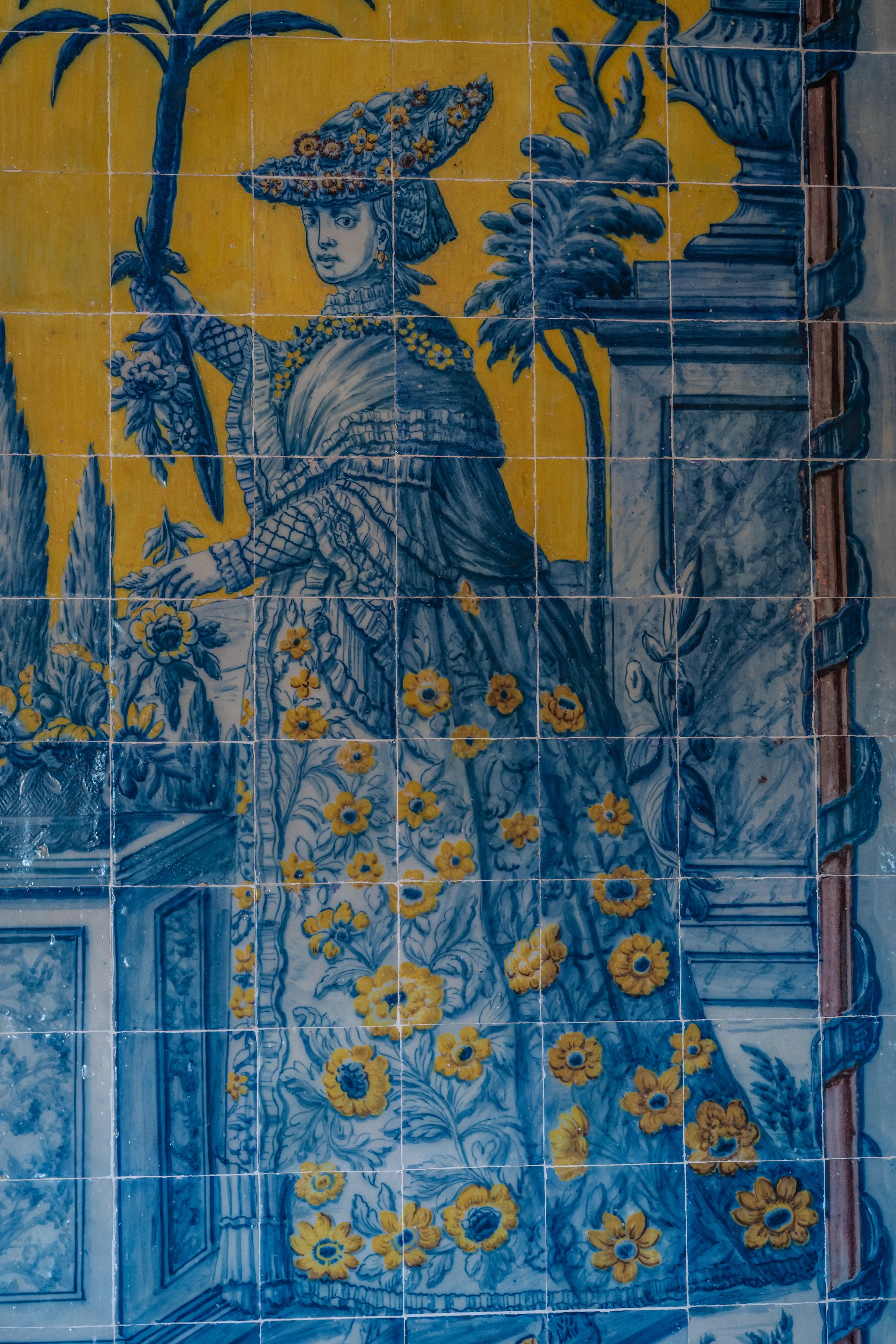 Azulejo Artistry: A Tiled Masterpiece of Blue, Yellow, and Narrative