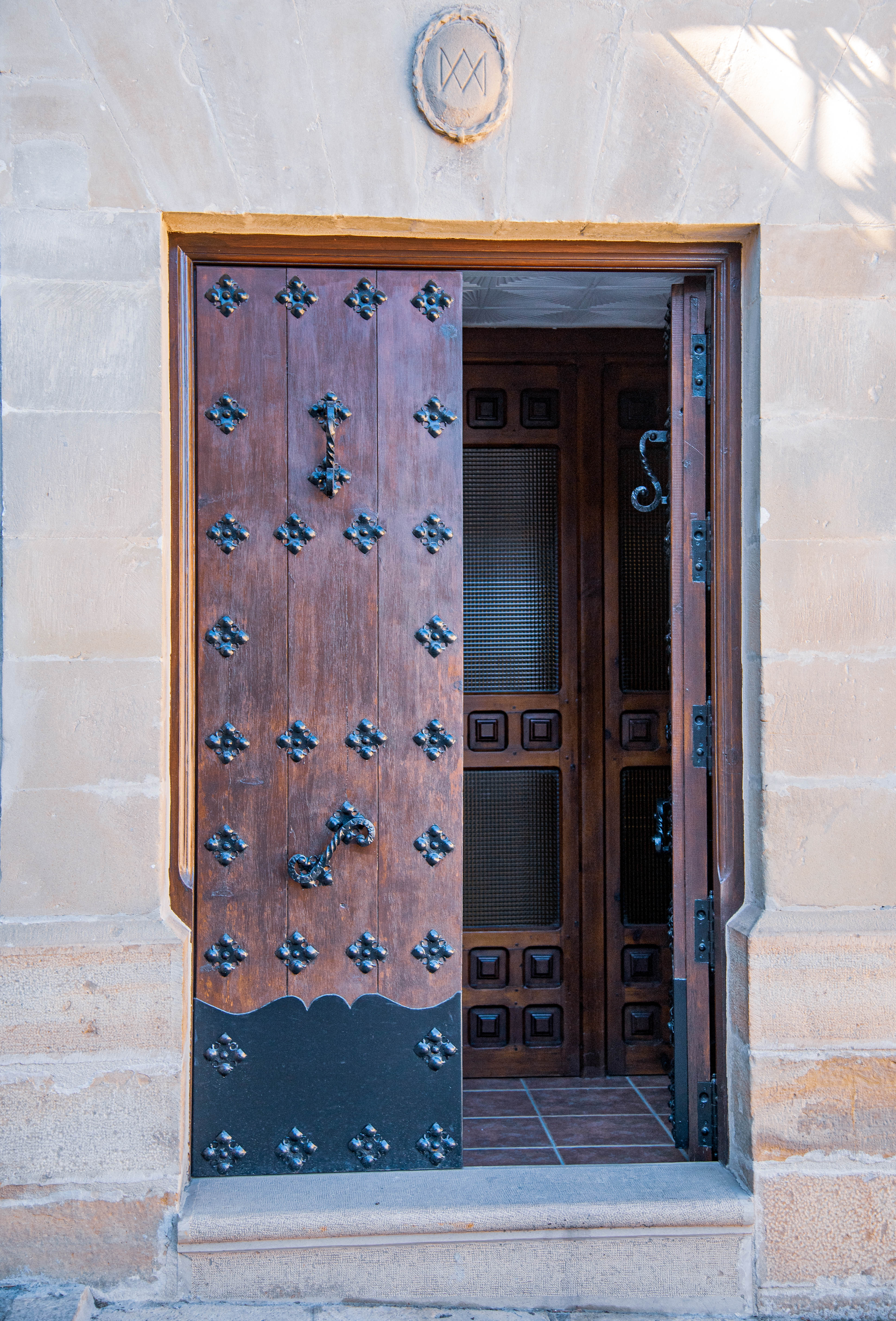 wooden door with intricate metalwork