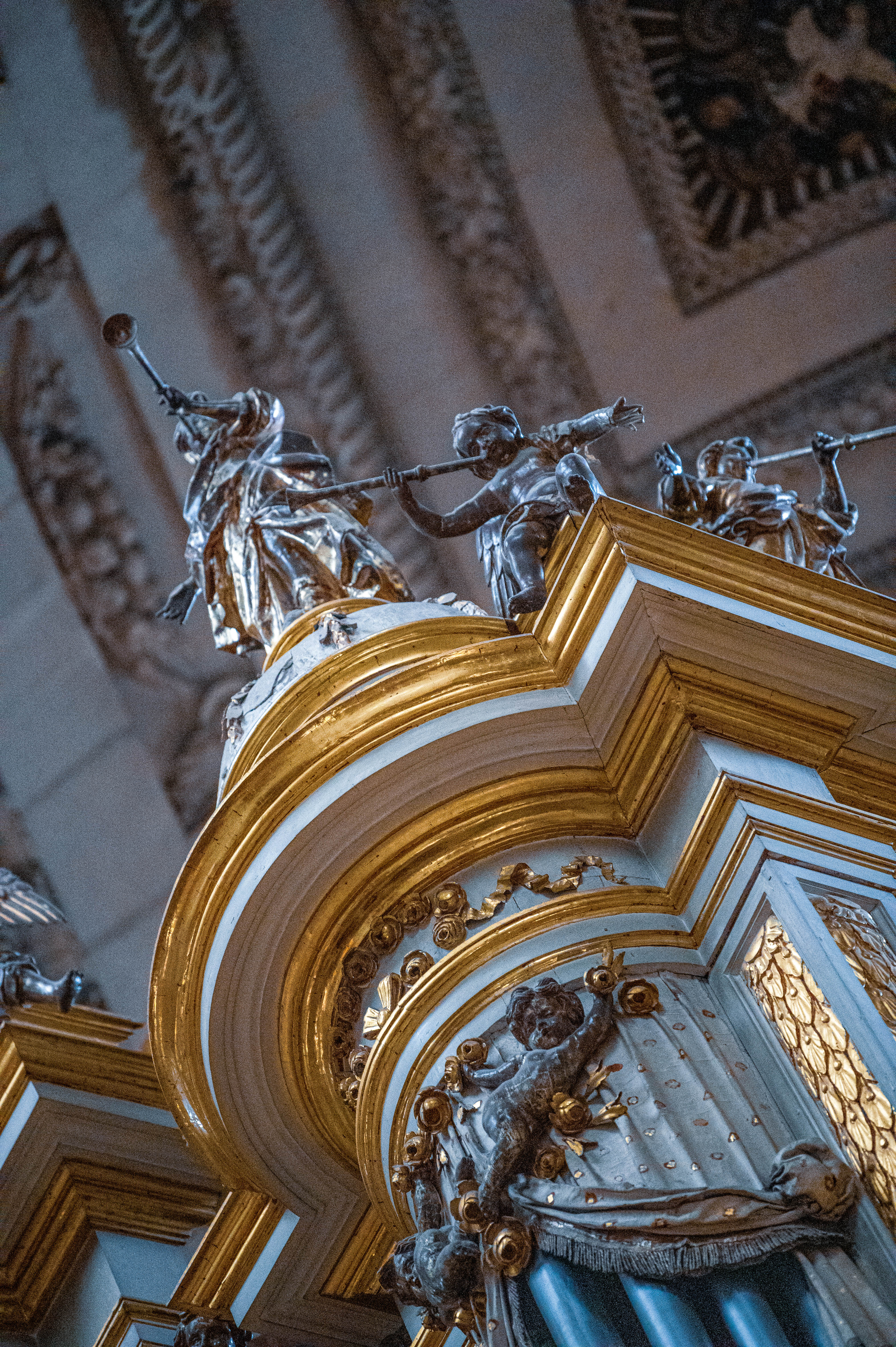 intricately designed archway adorned with sculpted figures