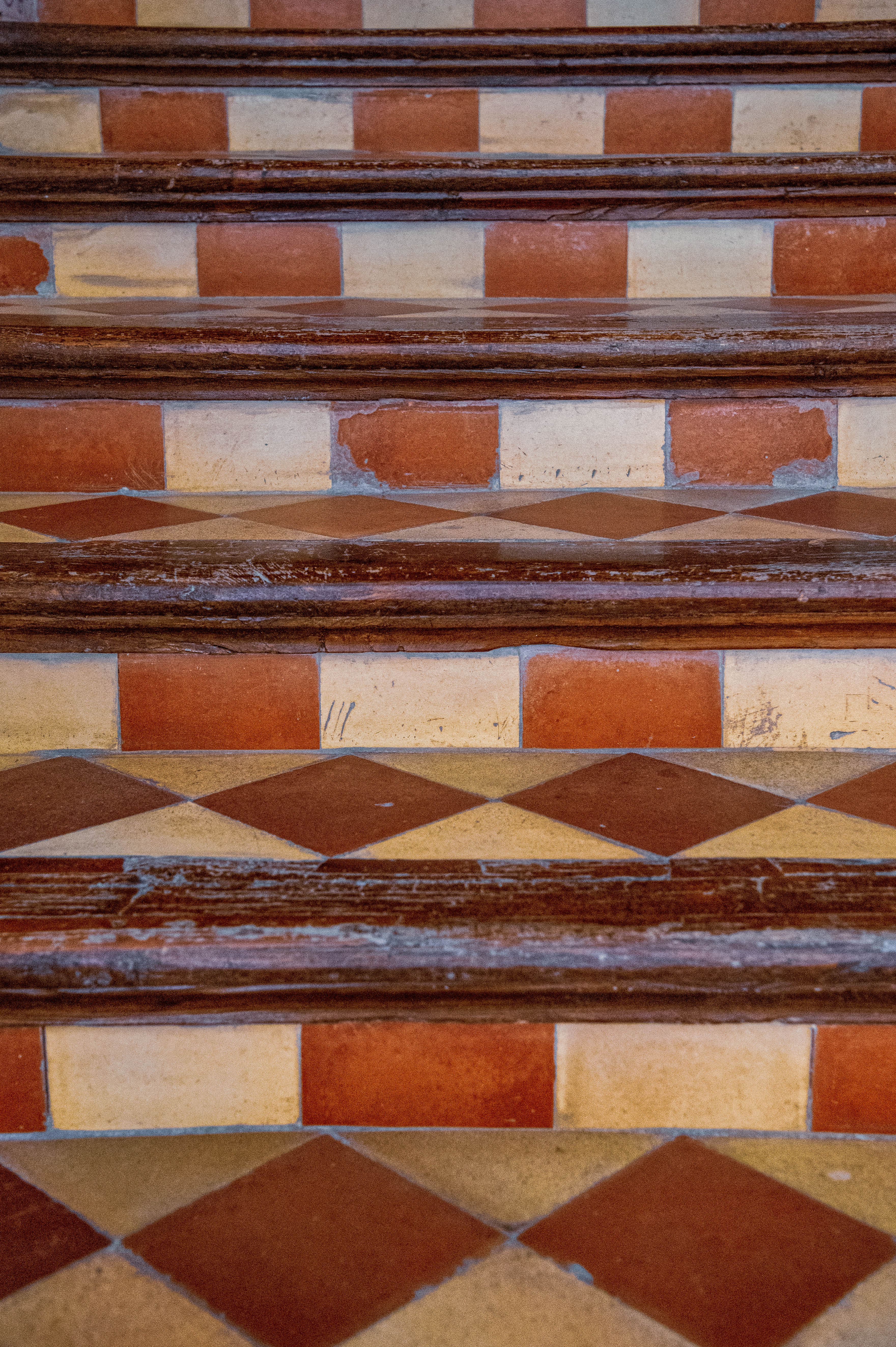 staircase with a patterned floor