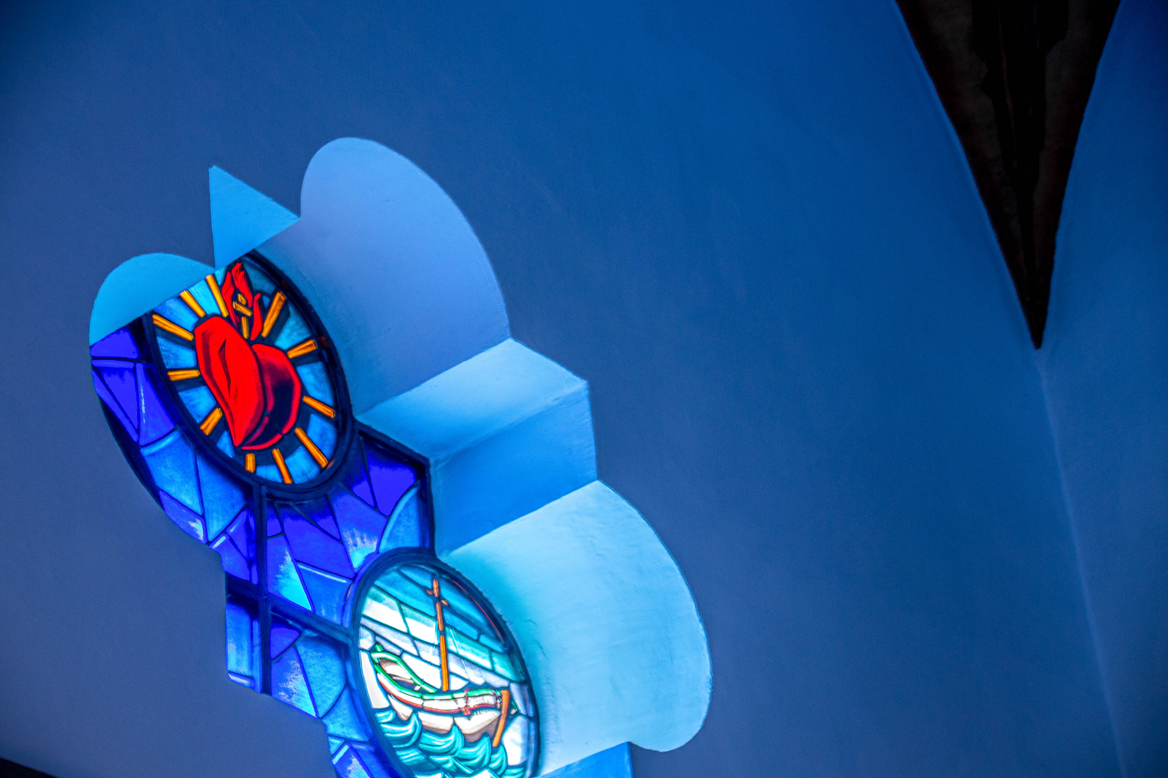 a stained glass window with two distinct sections