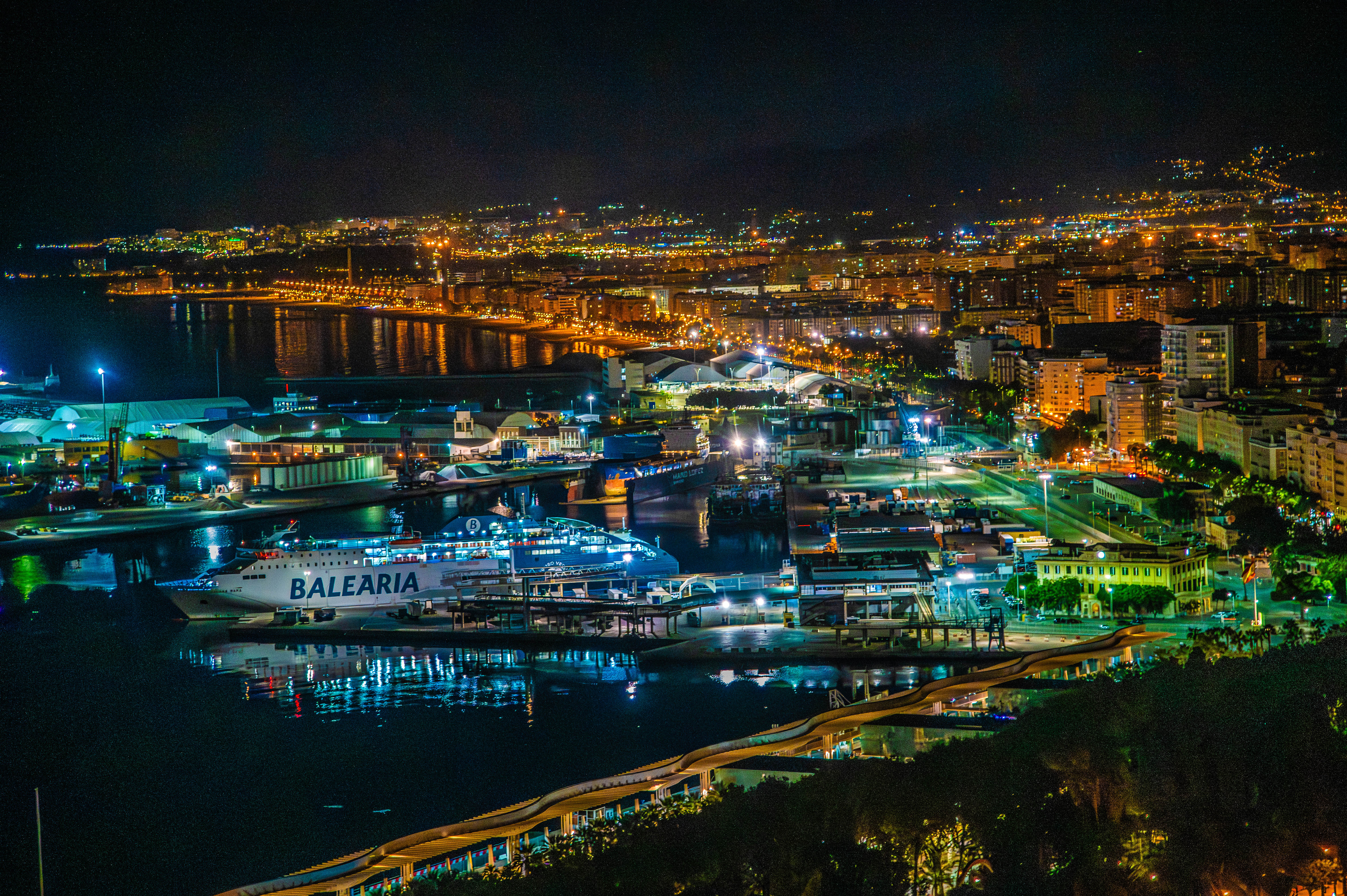  a vibrant night scene of a coastal city