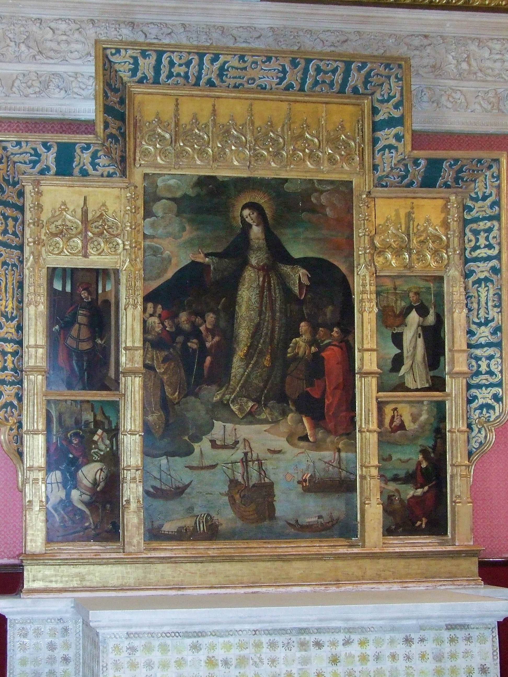 religious painting set within an ornate, gold frame